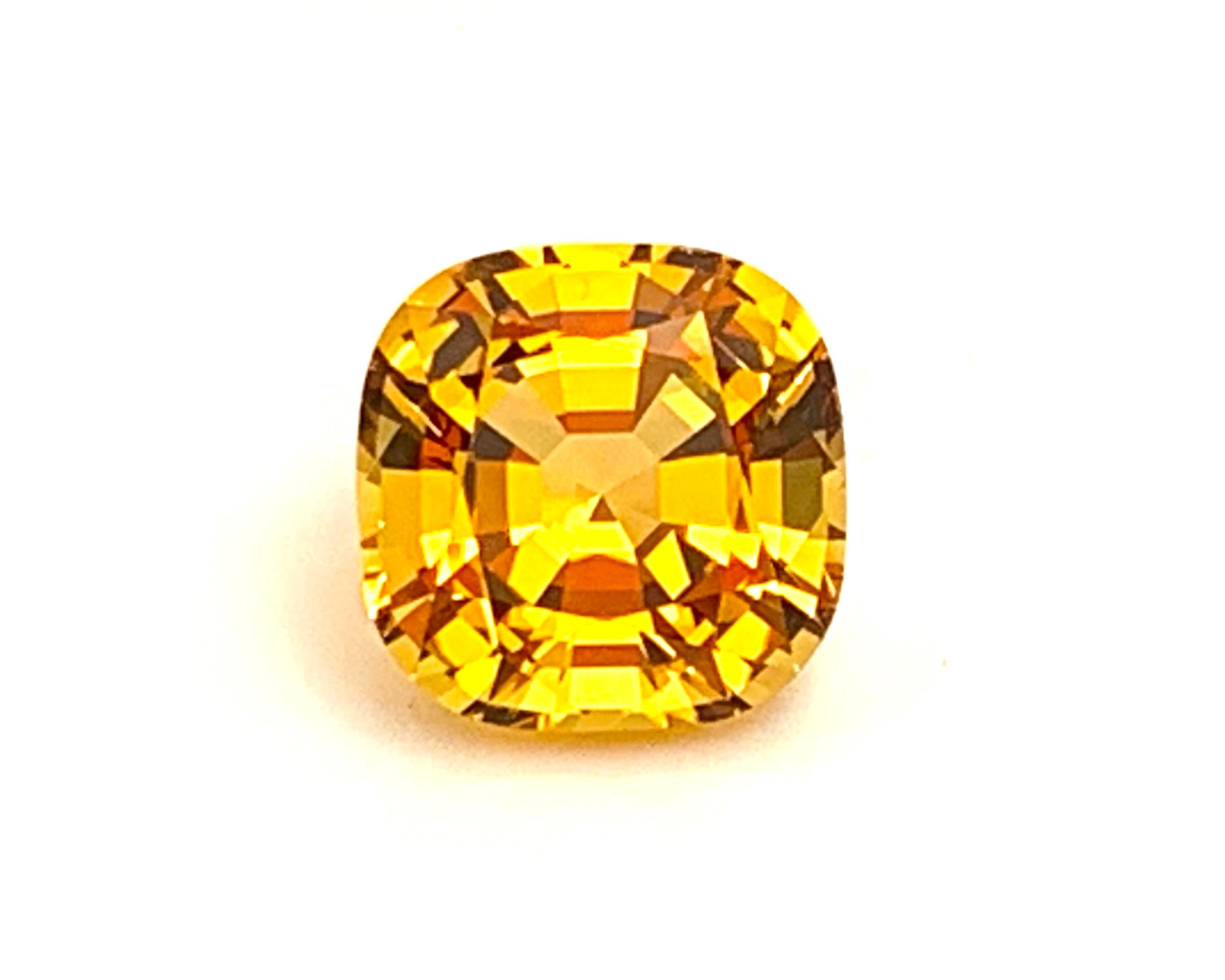This warm, golden precious topaz weighs 22.38 carats, has exceptional clarity, and would make an absolutely stunning pendant enhancer or impressive centerpiece for a gemstone collection. It is a strikingly brilliant stone with golden honey color,