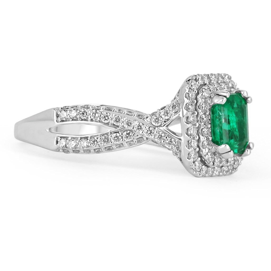 An exquisite emerald and diamond engagement/right-hand ring. The gorgeous setting lets sit a fine quality, earth-mined, natural emerald with beautiful vivid Muzo green color and excellent eye clarity. The color and clarity combination is so rare and