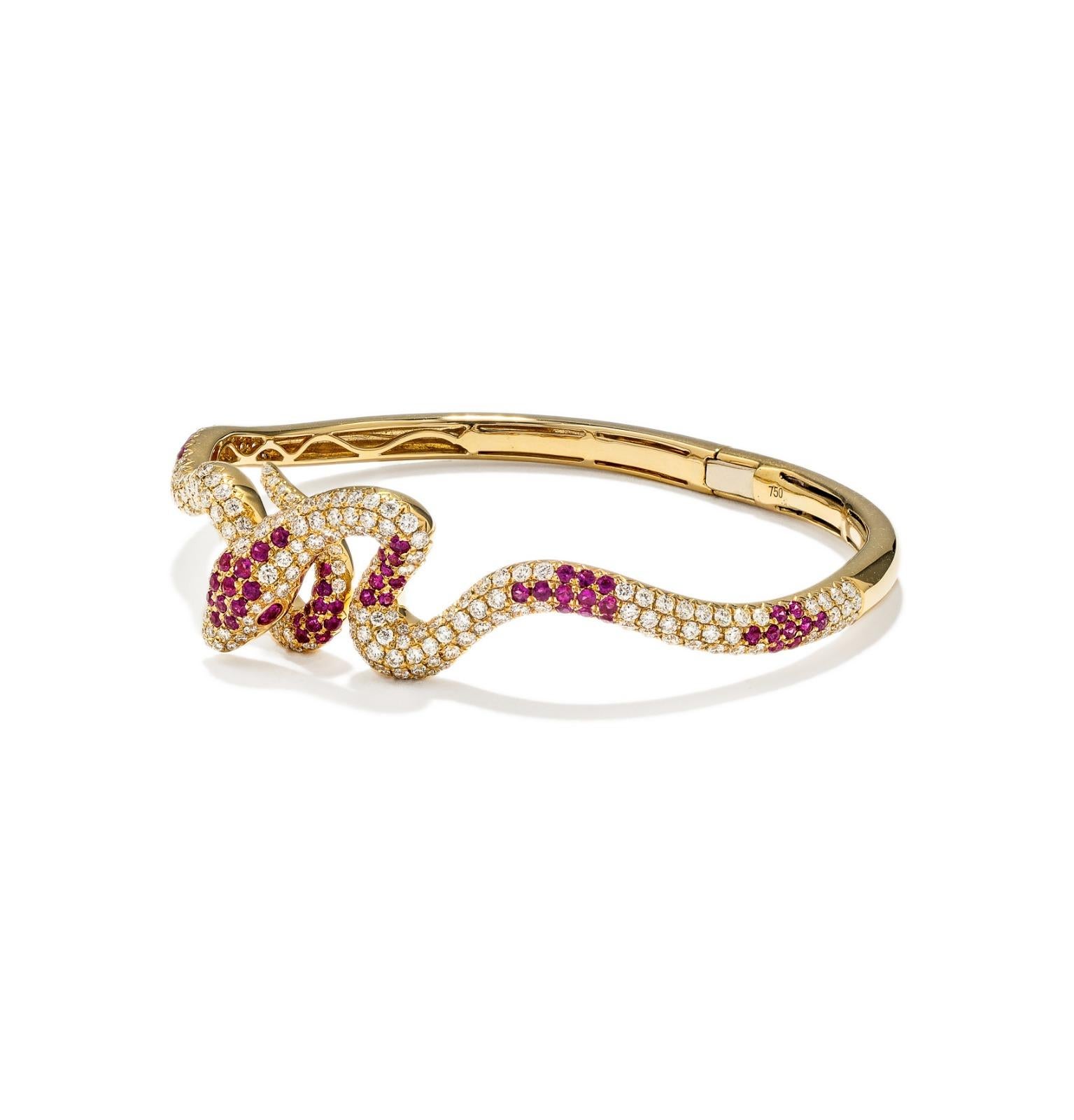 Primary Stone: Diamond
Shape : Round Cut
Weight: 2.24 Carats
Measurements :
Color: White & Ruby
Average Clarity: 
Accent Stones: Genuine Diamond
Shape Or Cut Diamond: Numerous Round Brilliants
Average Color/clarity Diamond: 
Total Gemstone Weight: