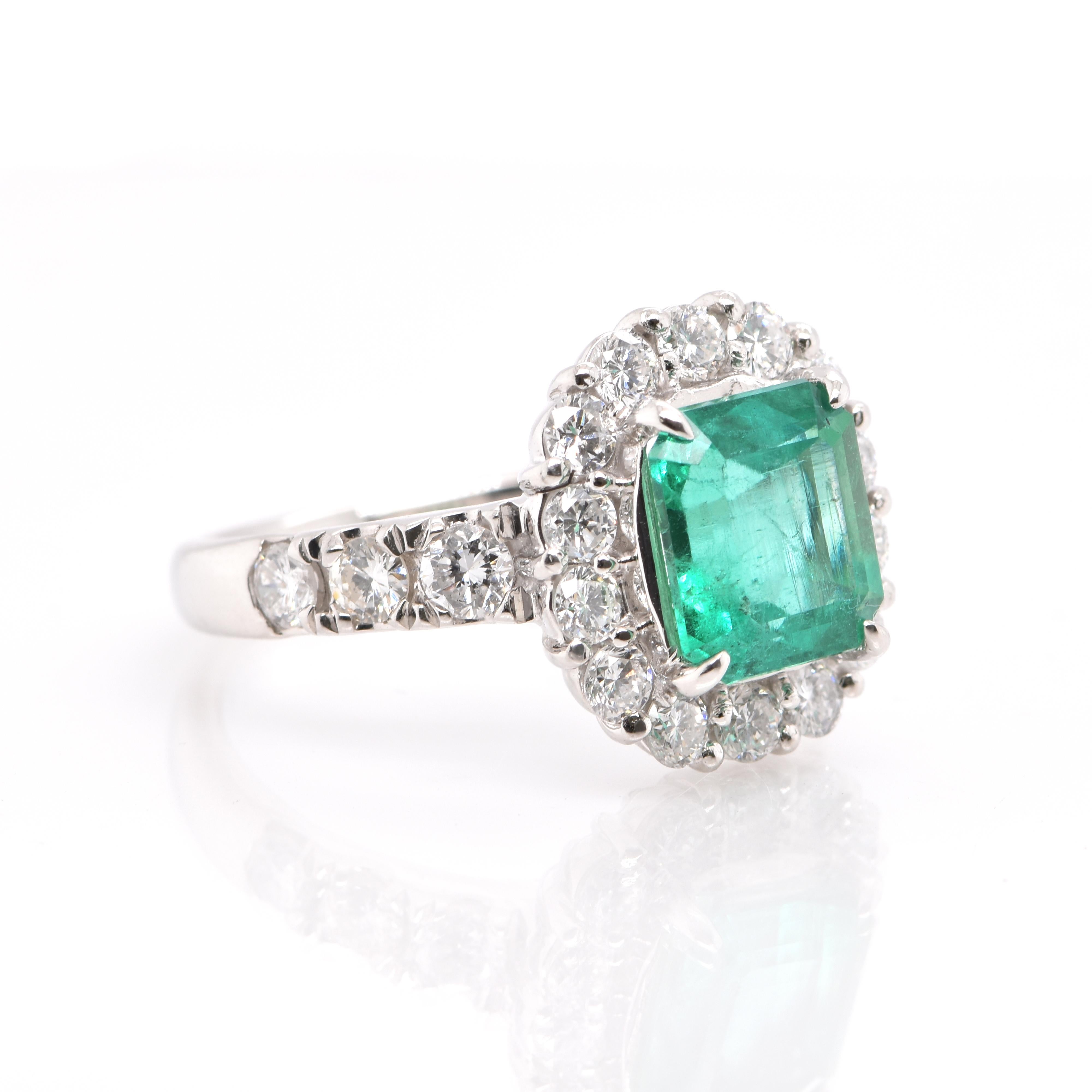 Modern 2.24 Carat Natural Emerald and Diamond Halo Engagement Ring Set in Platinum