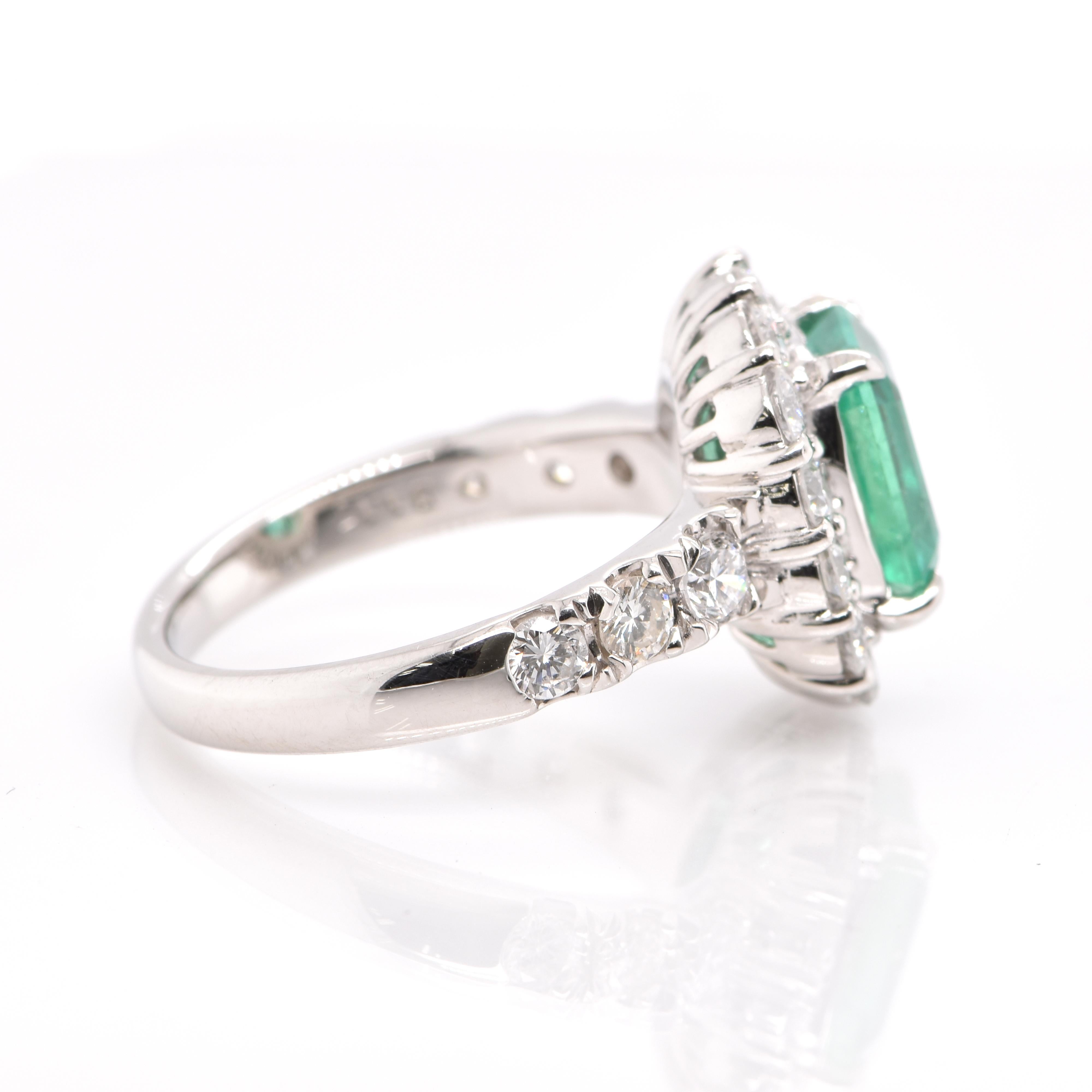 2.24 Carat Natural Emerald and Diamond Halo Engagement Ring Set in Platinum In New Condition In Tokyo, JP