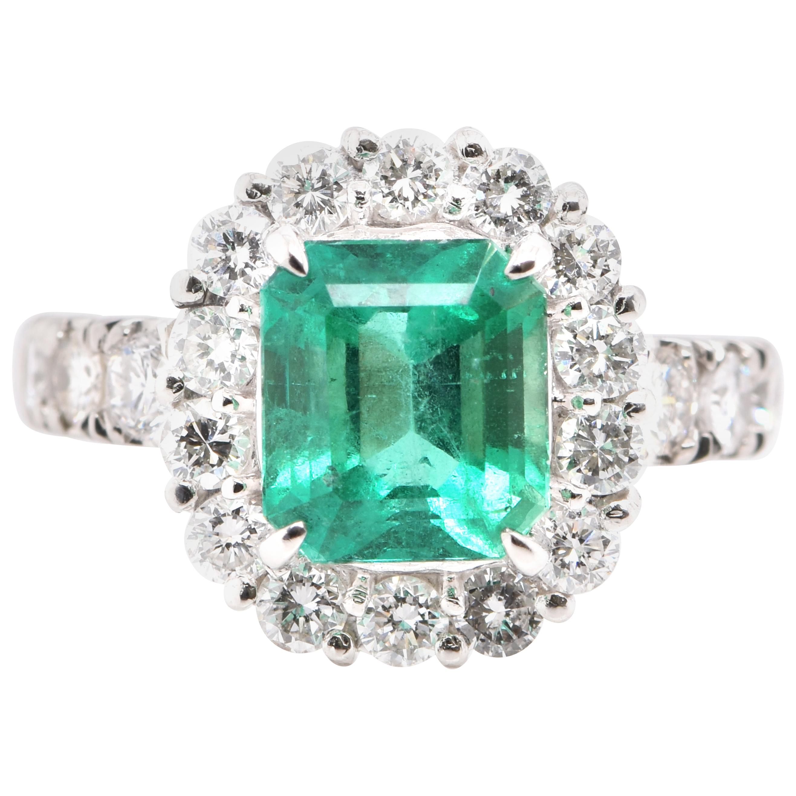 2.24 Carat Natural Emerald and Diamond Halo Engagement Ring Set in Platinum