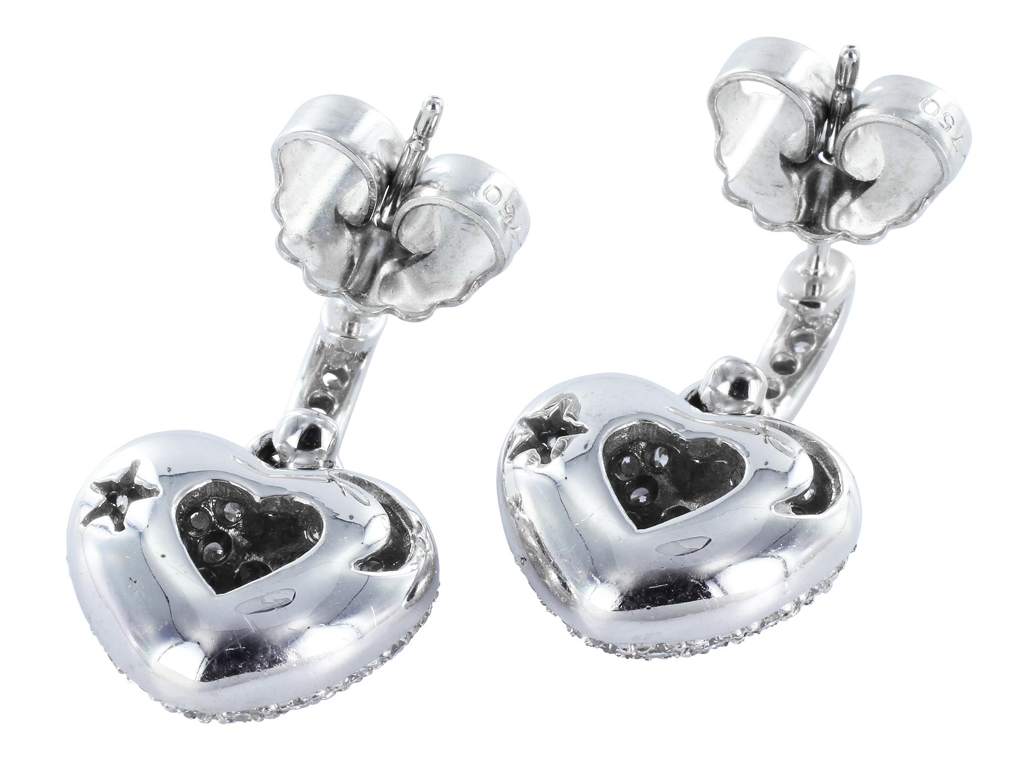 Modern 2.24 Carat Pave Set Diamond Heart Earrings For Sale