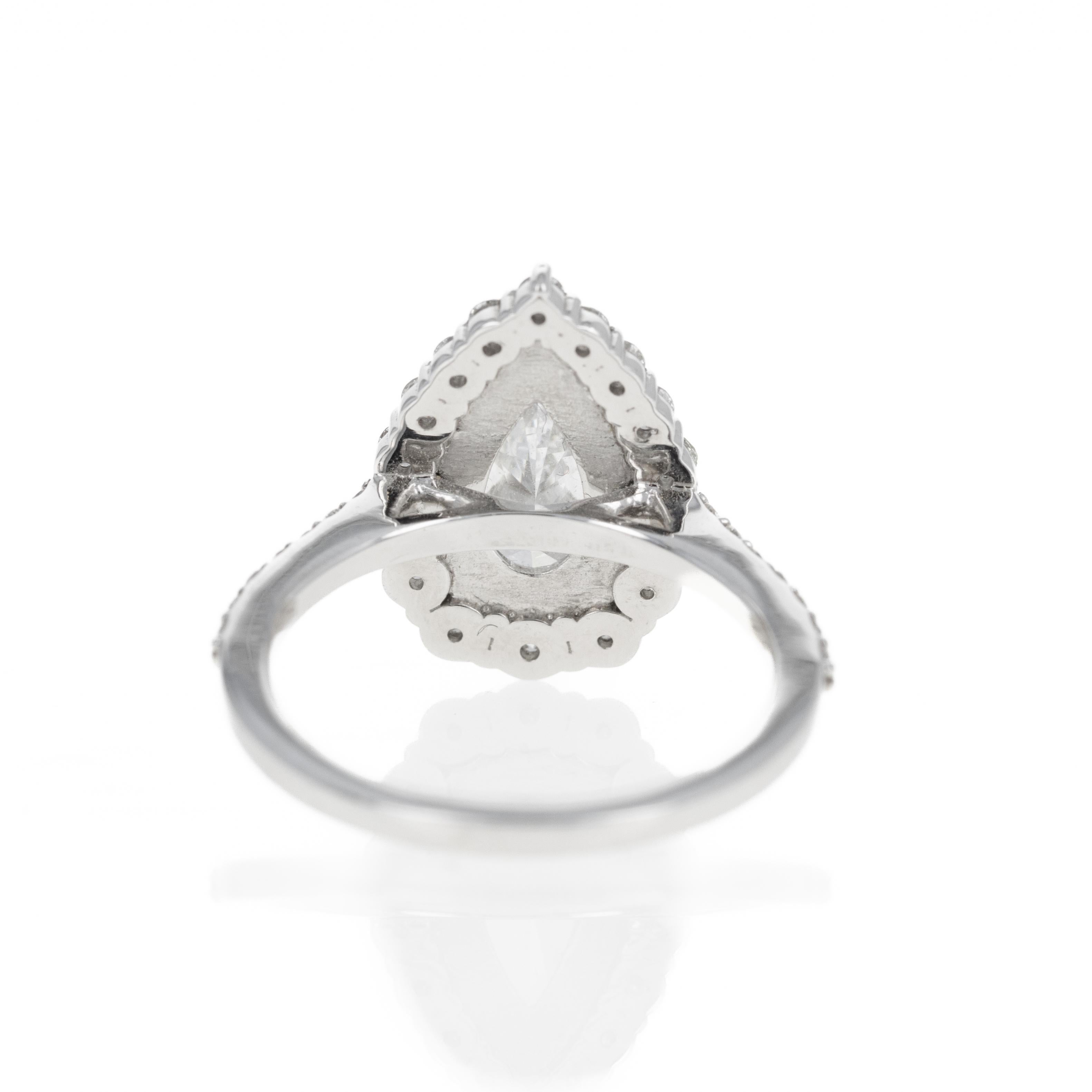 2.24 Carat Pear Diamond Graduated Halo Engagement Ring For Sale 1