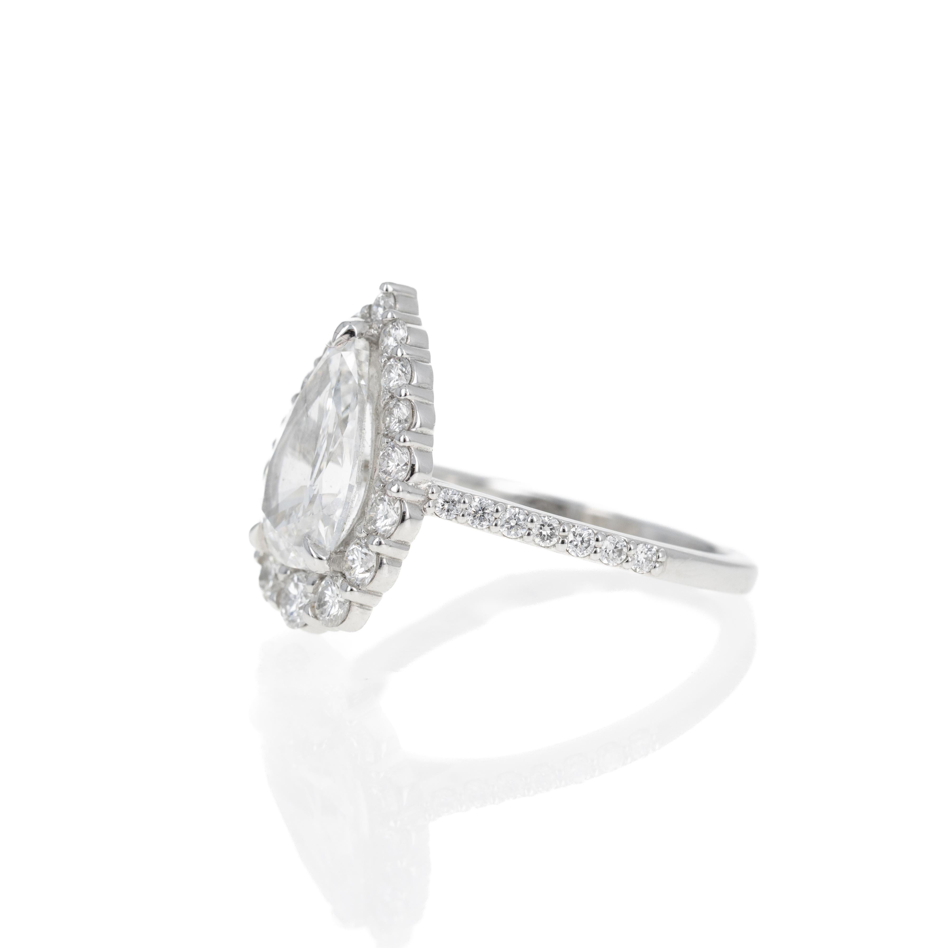2.24 Carat Pear Diamond Graduated Halo Engagement Ring For Sale 2