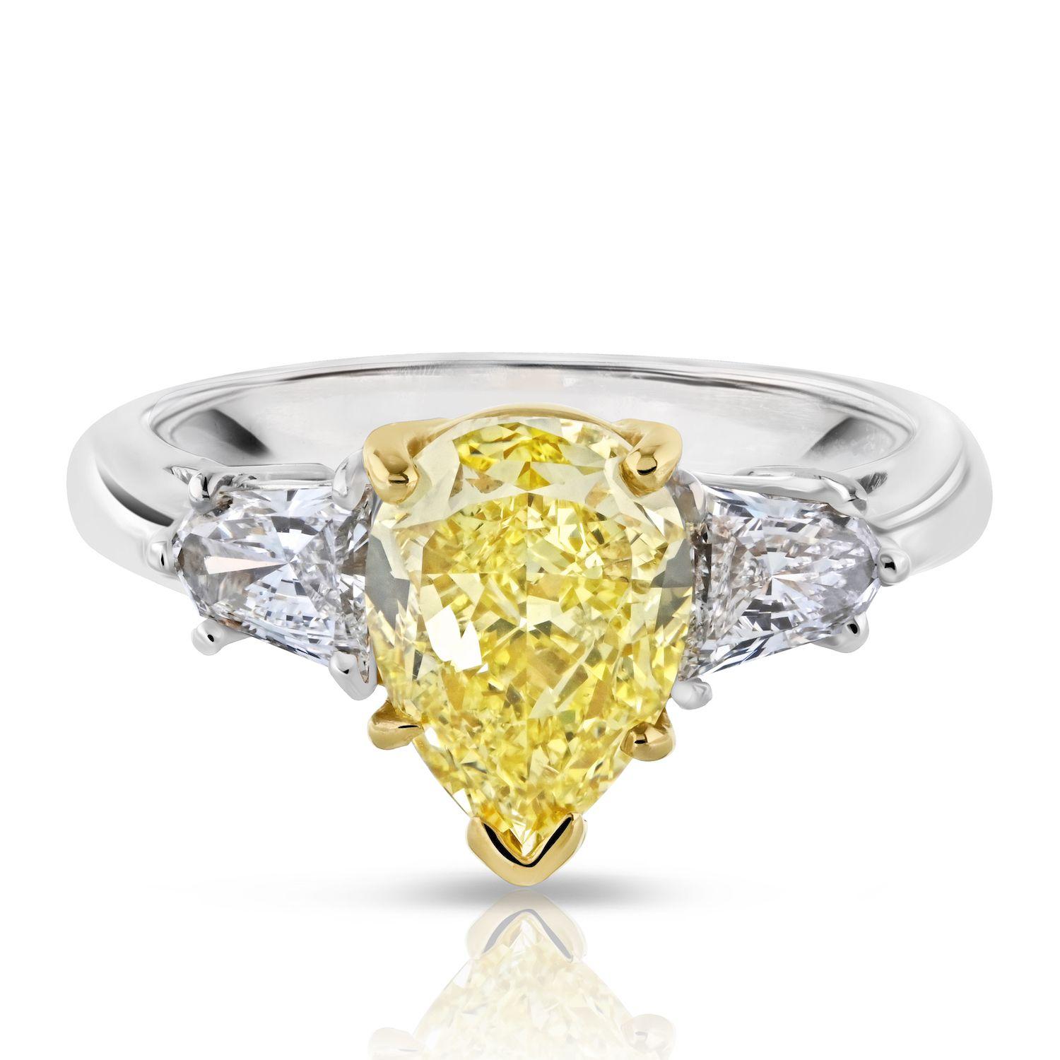 2.24 Carat Pear Shape Platinum &18K Yellow Gold Fancy Yellow Three Stone Diamond In New Condition For Sale In New York, NY