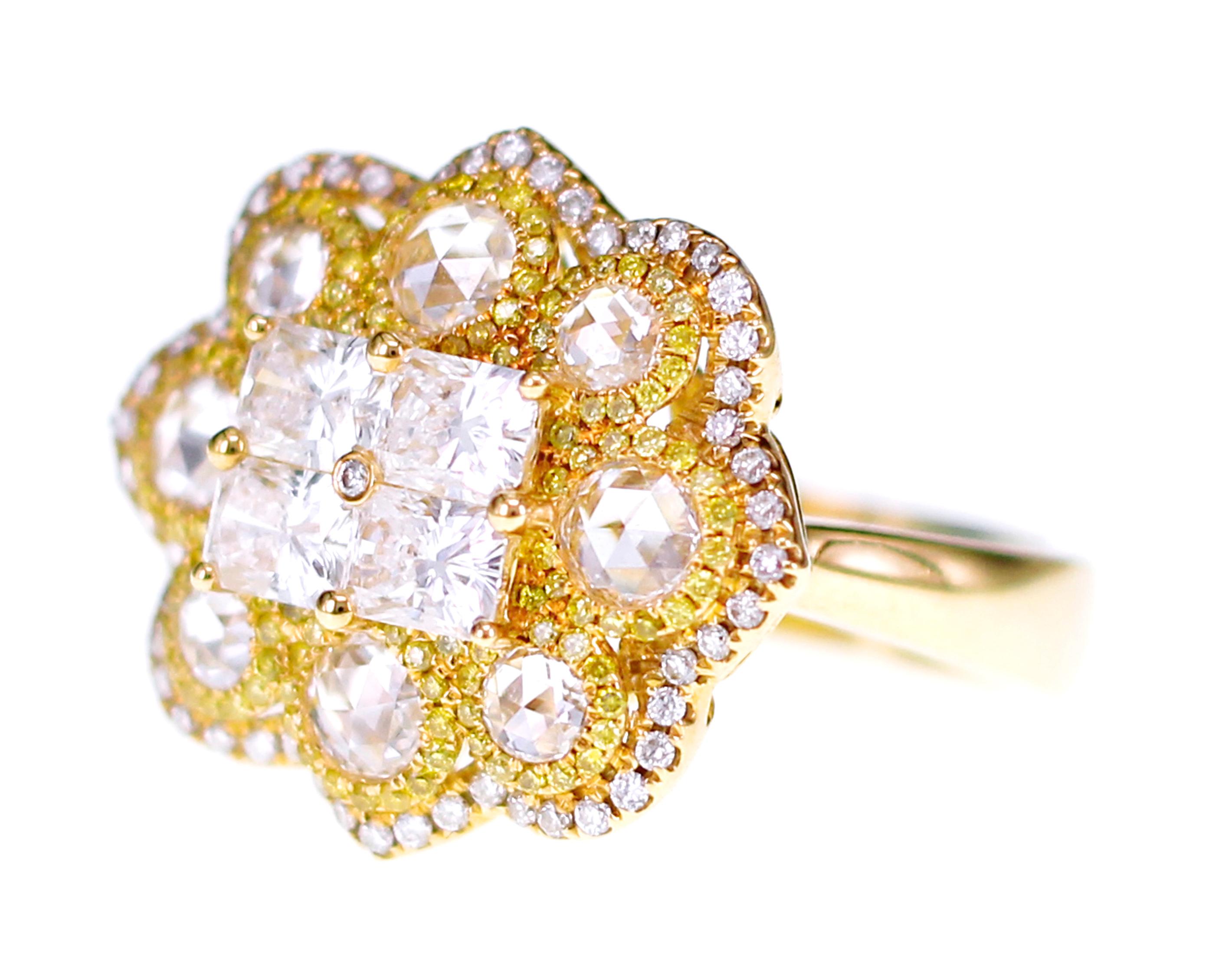 In total 2.24 carats of diamonds are set with white rose cut diamond. Vivid yellow diamonds are sprinkled on the border of the rose cuts to highlight a great combination of brilliance and fancy cut.