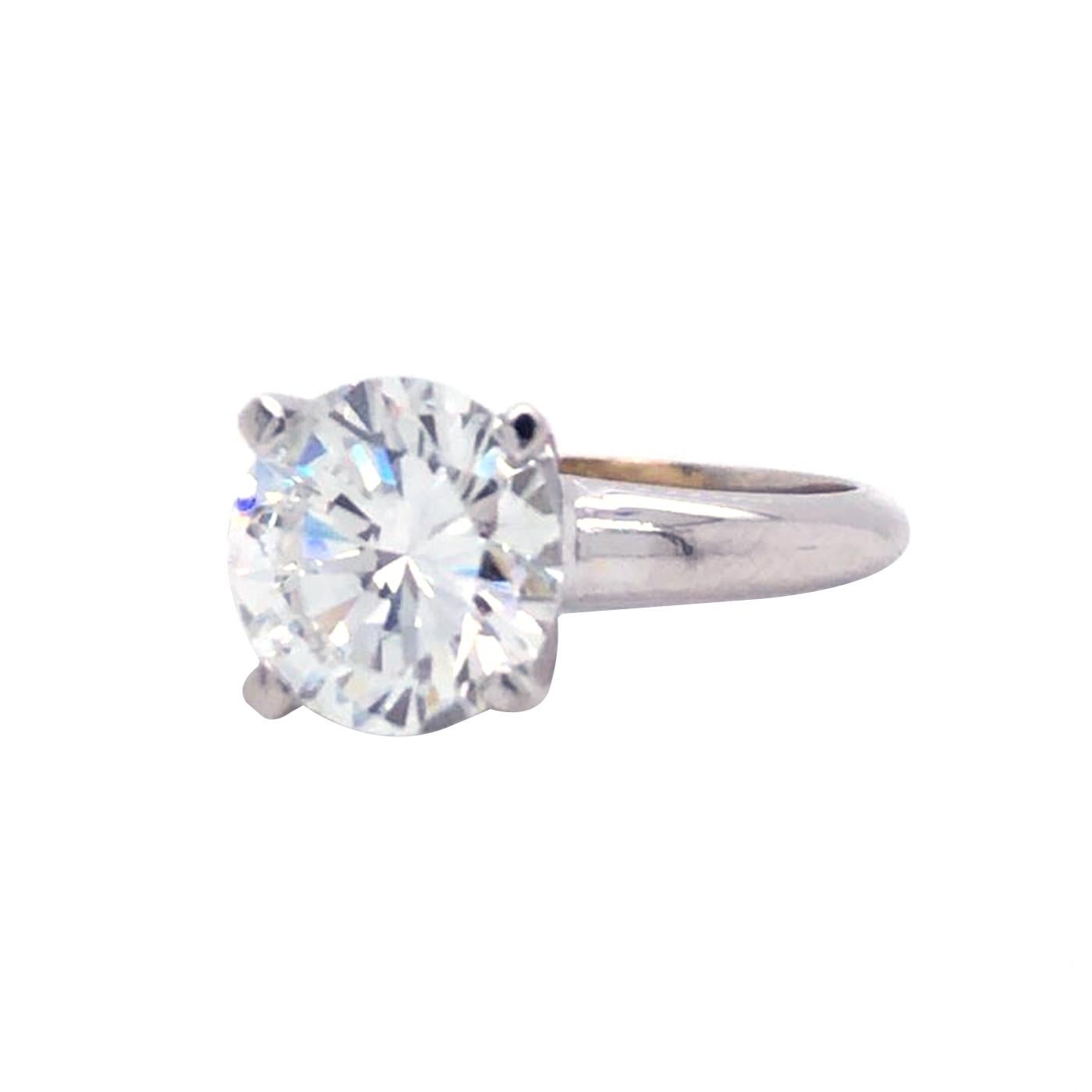 Center Round Brilliant  F - Color, Si2  Clarity, 100% eye Clean, 8.60mm -8.62mm Solitaire 14 Karat White Gold ring, One of the beautiful diamonds, The ring weighs 5.3 grams, and is currently size 5.5, with easy adjustment up or down. Accompanied by