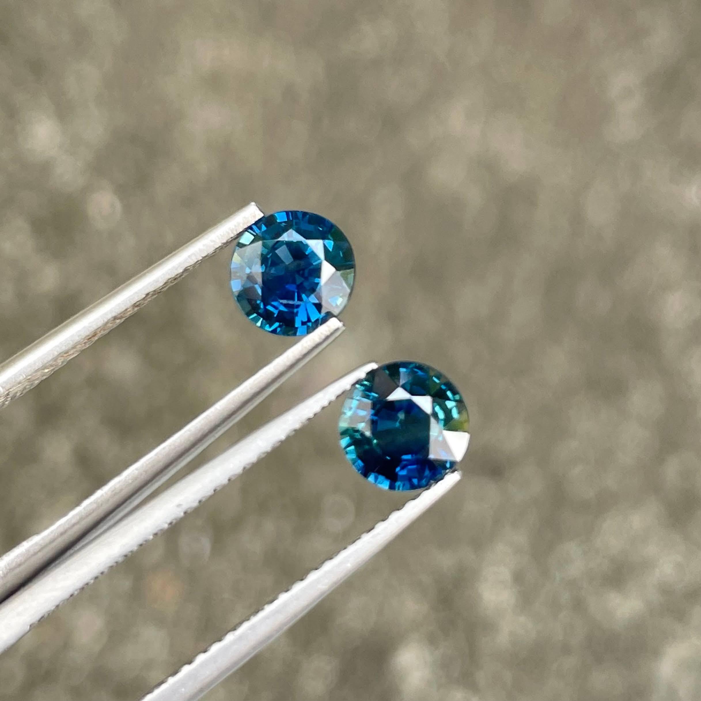 Modern 2.24 carats Teal Blue Sapphire Pair Round Cut Natural Madagascar's Gemstone For Sale