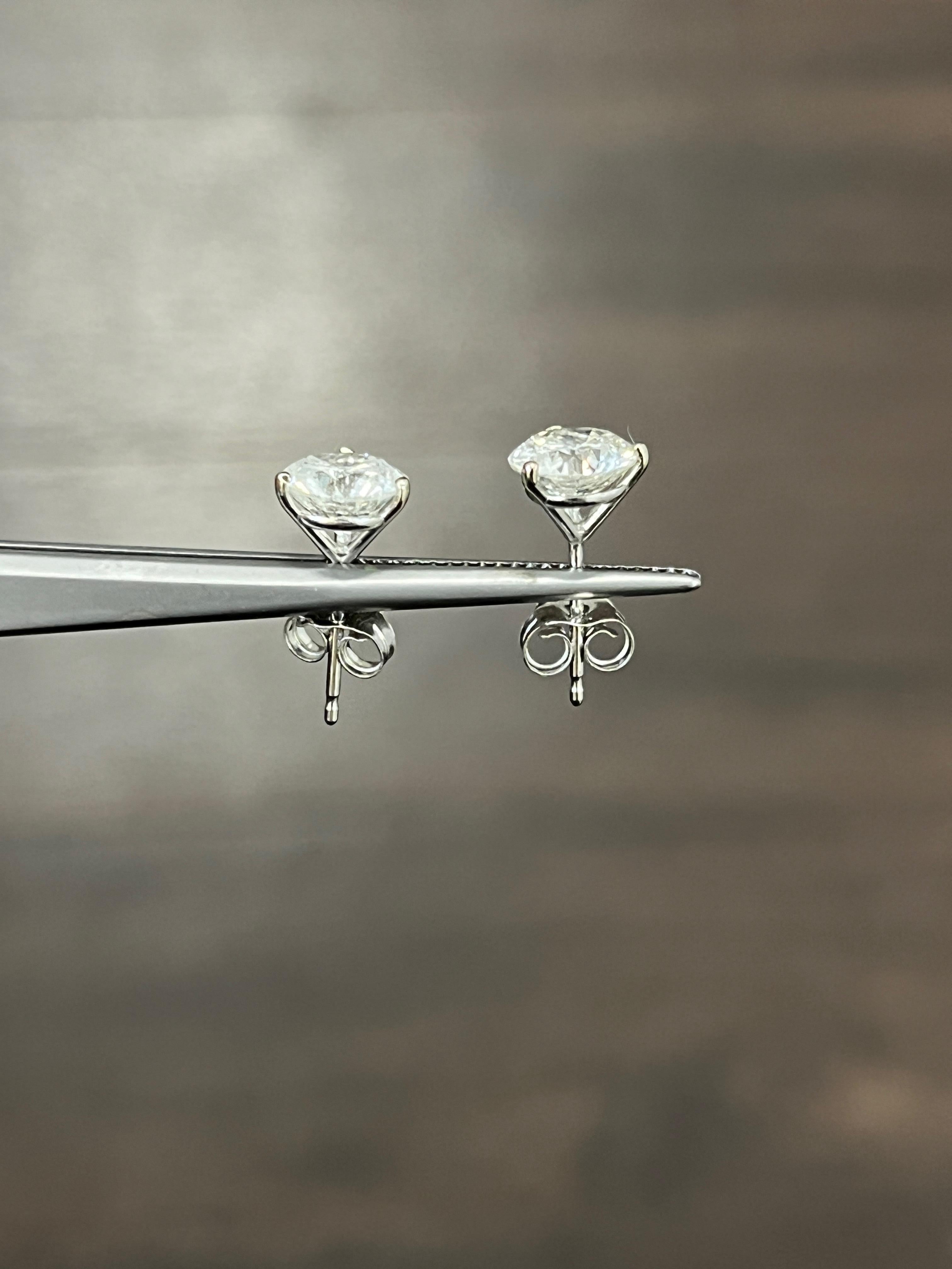 These gorgeous 2.24 ct diamond studs are G/H in color, and SI2/I1 in clarity. 