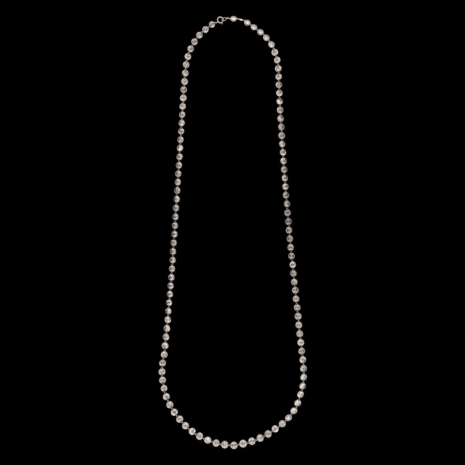 A beautiful diamond and platinum long necklace by Hancocks, the 28