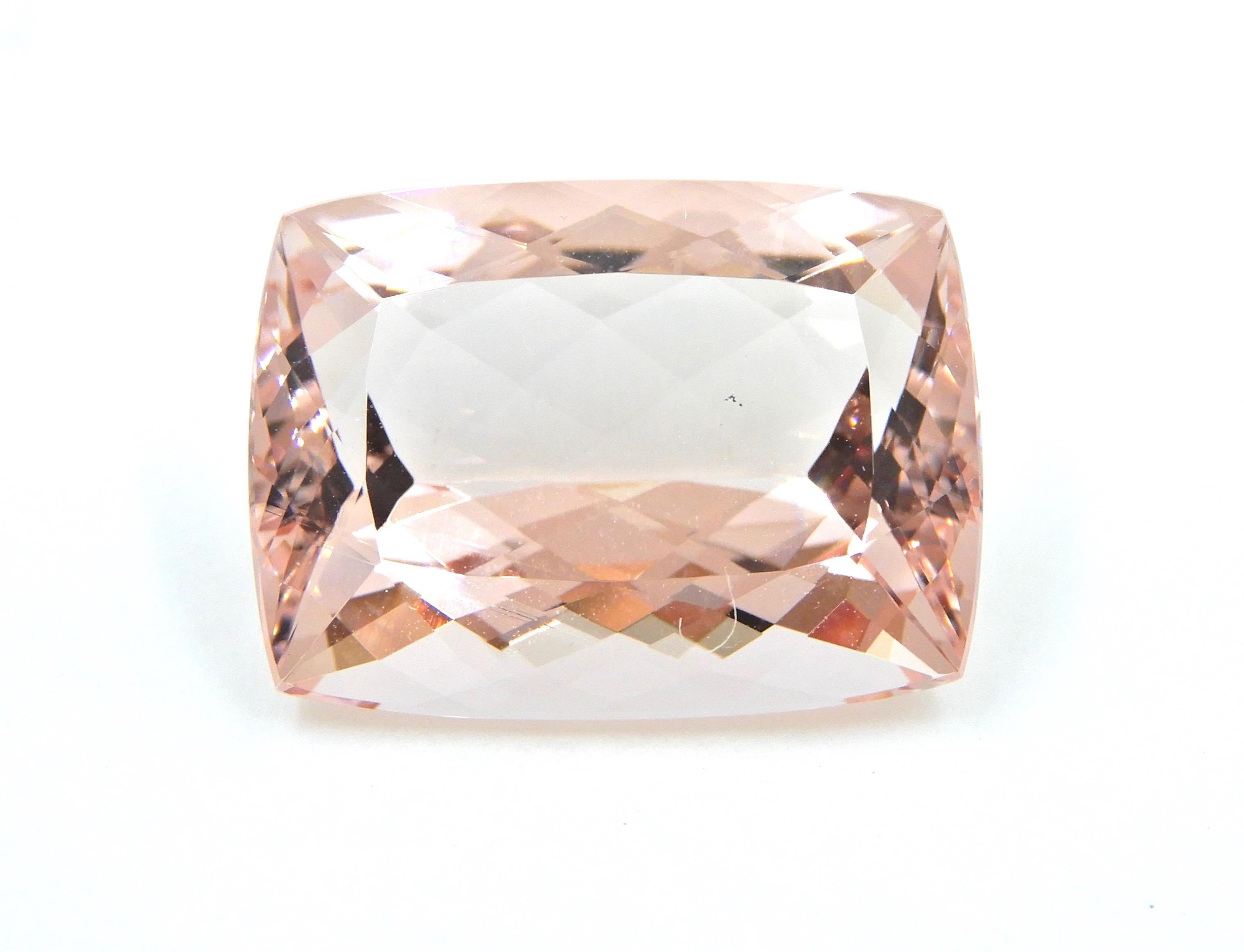 Look no further than this amazing 22.46 Carat Cushion Cut Morganite Loose Gemstone for the start of your dream ring, pendant, brooch or any jewellery your heart desires.

This cushion cut is everything and the photos can't do it justice.  
20.5mm x