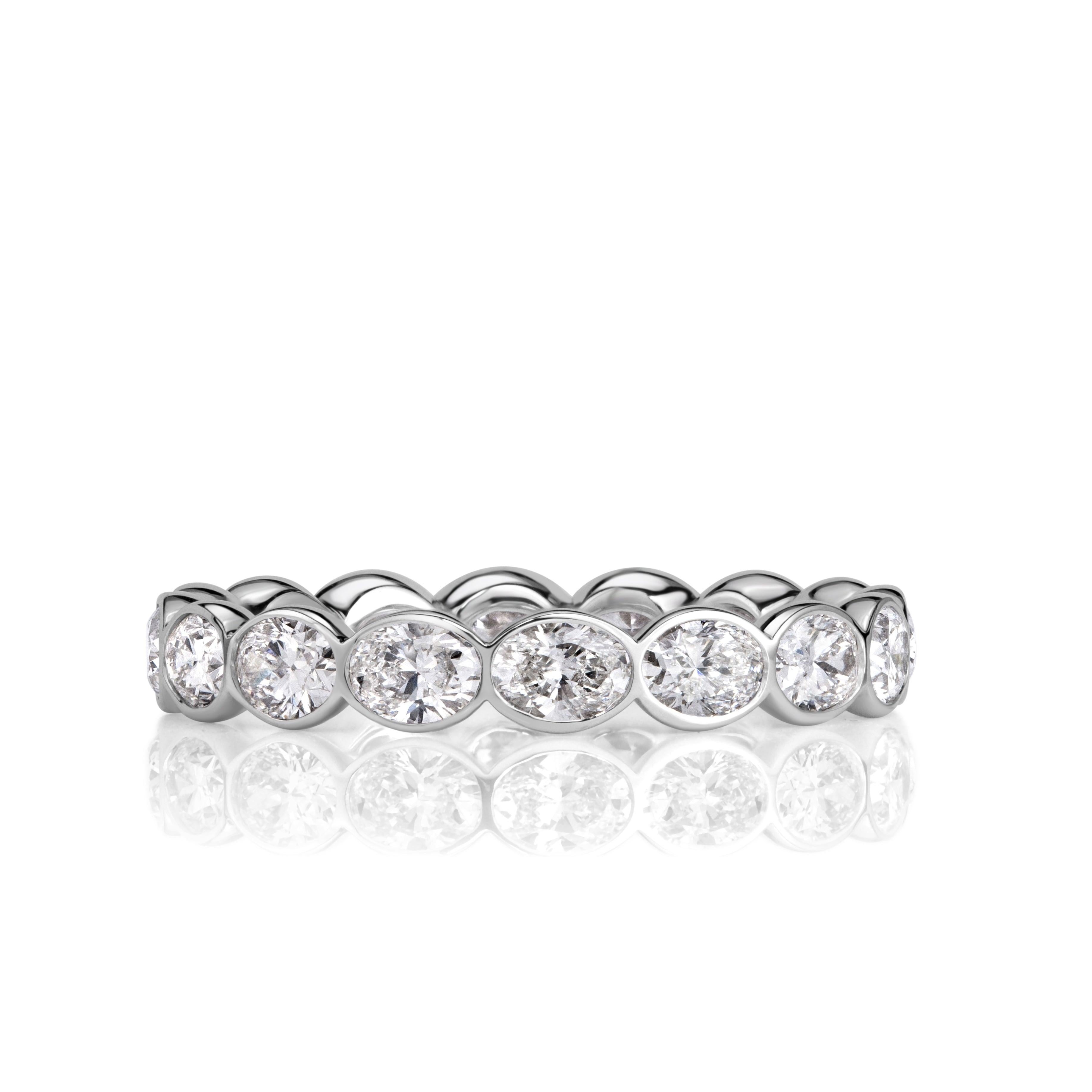 2.24ct Oval Cut Diamond Bezel Set Eternity Band in 18K White Gold For Sale