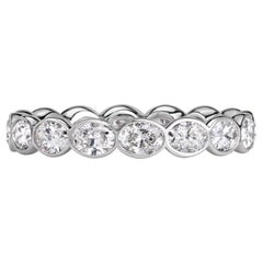 2.24ct Oval Cut Diamond Bezel Set Eternity Band in 18K White Gold