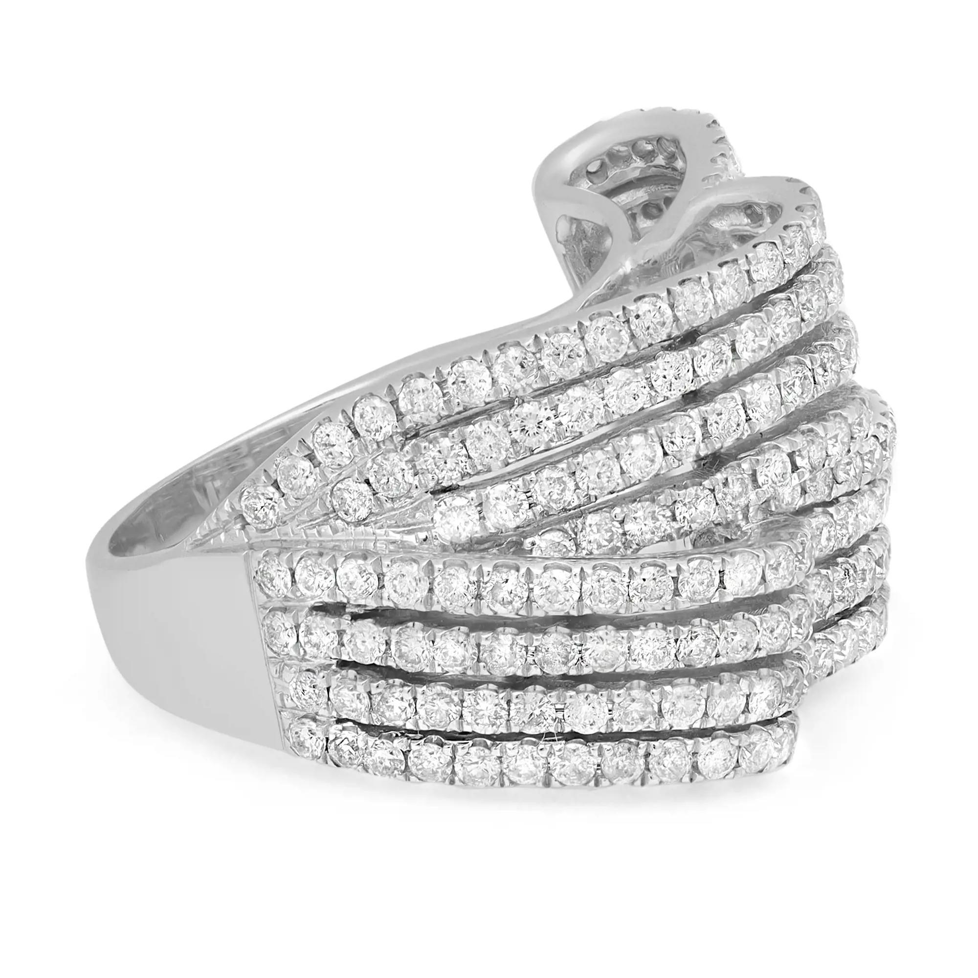 This beautiful diamond ladies cocktail ring exceptionally showcases prong set round cut diamonds in a unique waves shape shank. Crafted in fine 14k white gold. Total diamond weight: 2.24 carats. Diamond quality: color H-I and SI2-I clarity. Ring