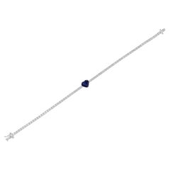 Schmuck aus 18 Karat Weißgold mit 2,25 Karat blauem Saphir und 3,18 Karat SI/H Diamant