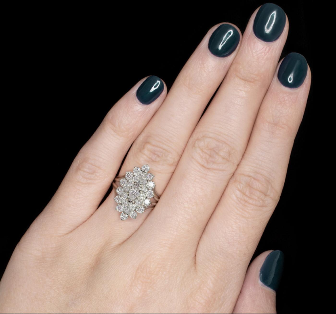 Diamond cluster ring is glamorously big and brilliant, so dazzling with sparkle it could catch your eye from across the room! Set in a dazzling cluster, the 2.25 carats of vibrant natural diamonds offer an eye catching, brilliant display! All bright