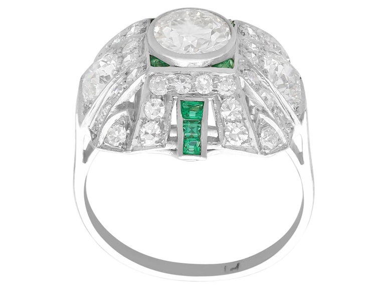 Women's or Men's Art Deco 2.25 Carat Diamond and Emerald Platinum Cluster Ring
