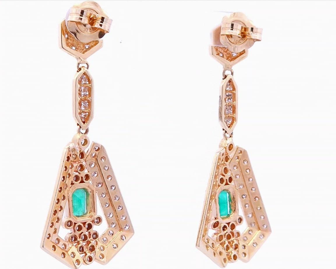 Quality, at the right price.

These designer dangle earrings feature a total carat weight of 2.26 emeralds. These earrings also have a total carat weight of 4.10 carats of round diamonds  This one of a kind designer piece comes set in 14K yellow