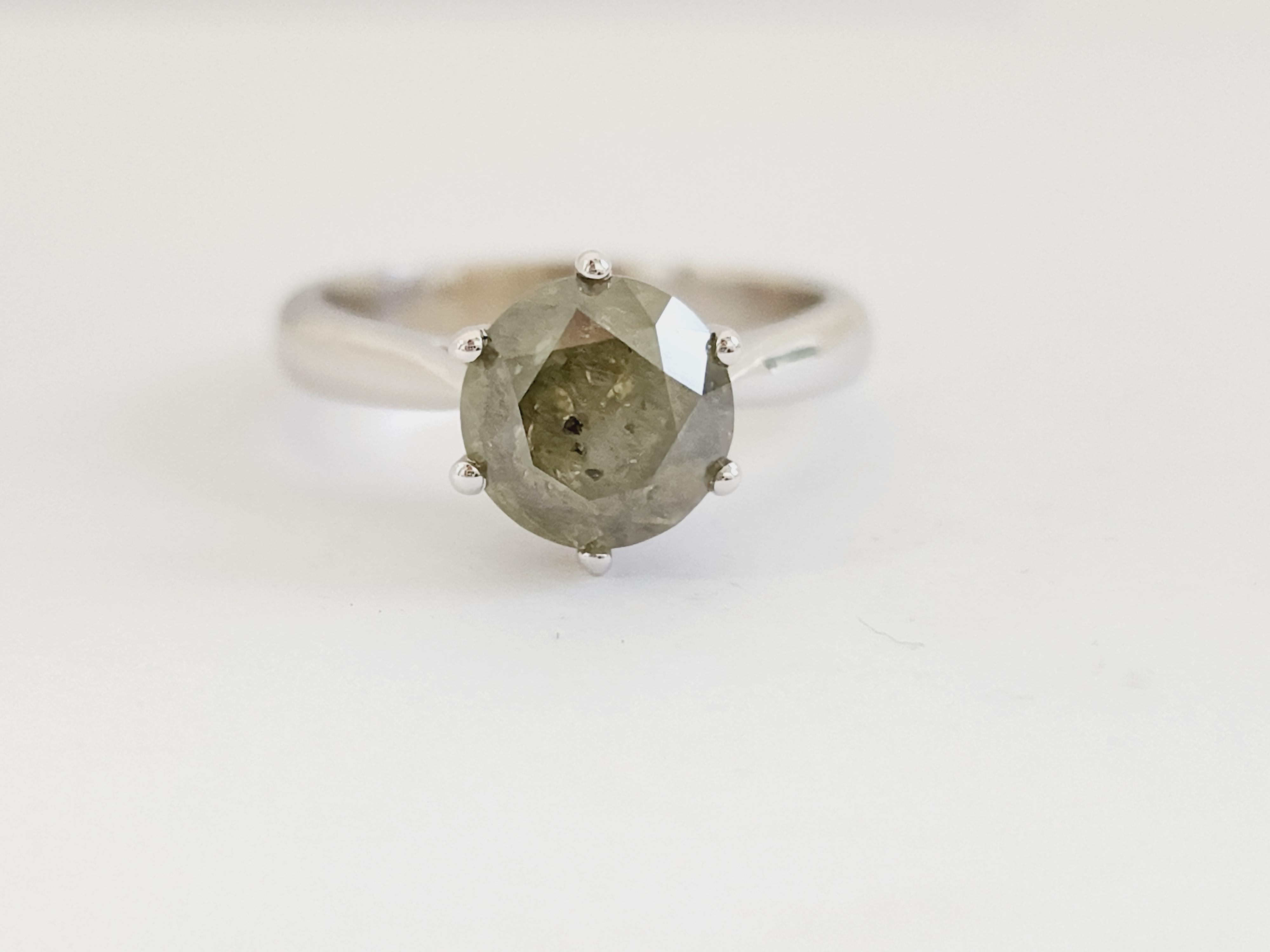 Natural GIA 2.25 Carat Green Round Diamond Ring 14 Karat White Gold. Set on 6-prong 14K solitaire white gold ring.
Ring size: 6.5