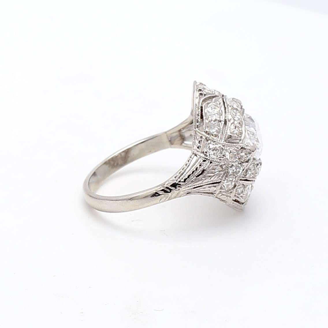 2.25 Carat Marquis Shape and Round Brilliant Diamond Platinum Art Deco Ring In Good Condition For Sale In New York, NY