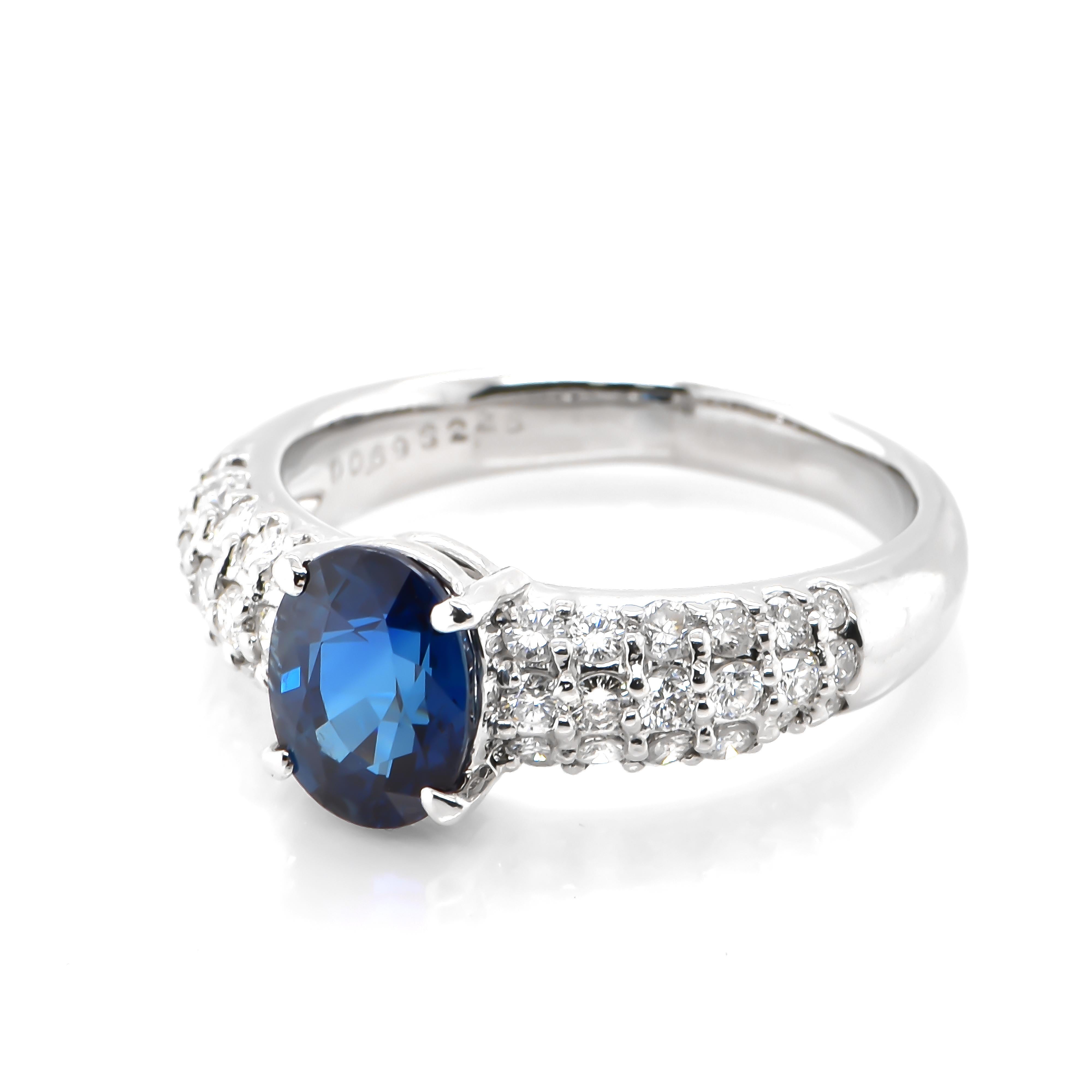 Modern 2.25 Carat Natural Blue Sapphire and Diamond Cocktail Ring Made in Platinum For Sale