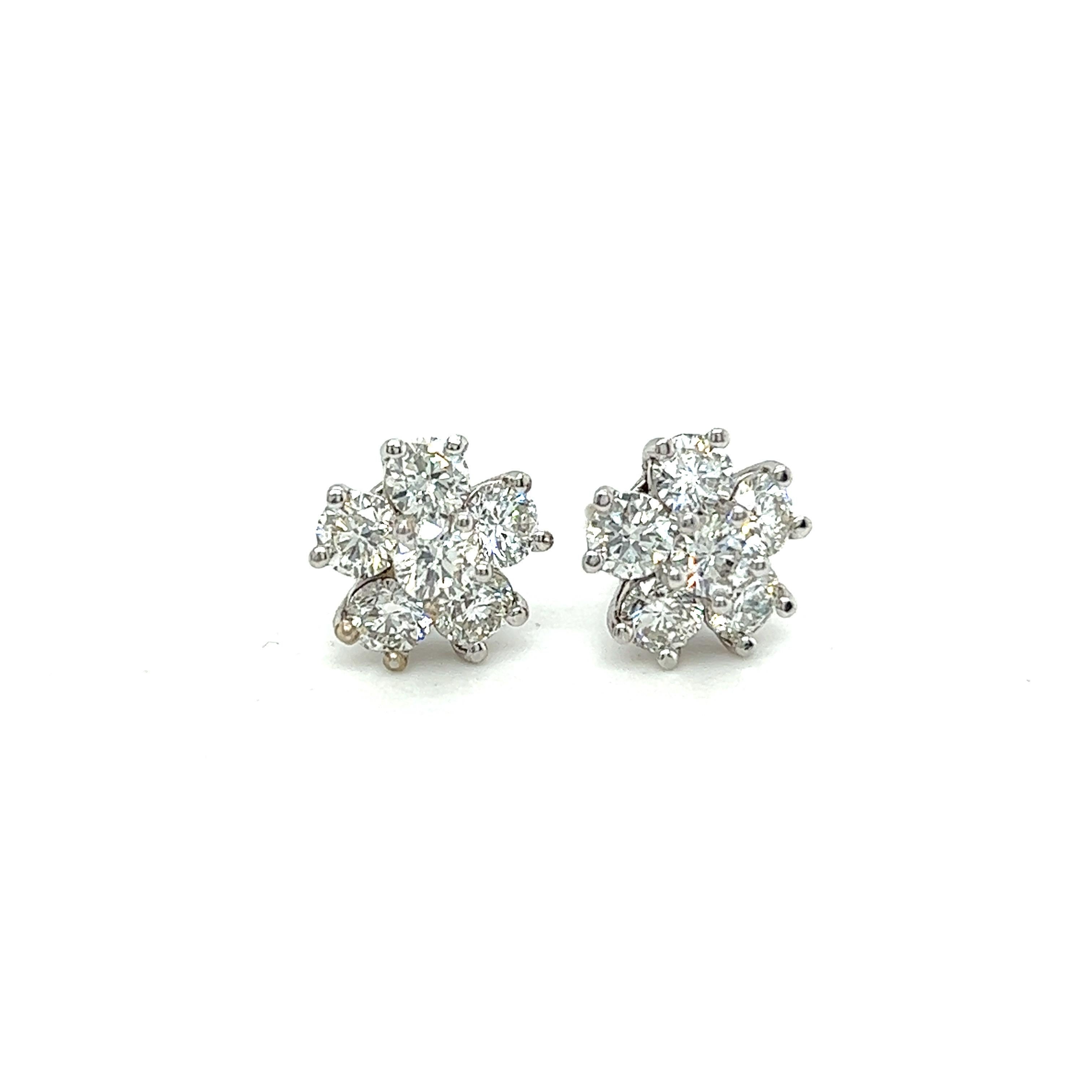 2.25ct total weight Natural Earth Mined Diamond earrings
6 Diamonds per stud are placed together to create a flower shape 12 diamond stones in total
14k white gold
ESTATE 
Made in Miami