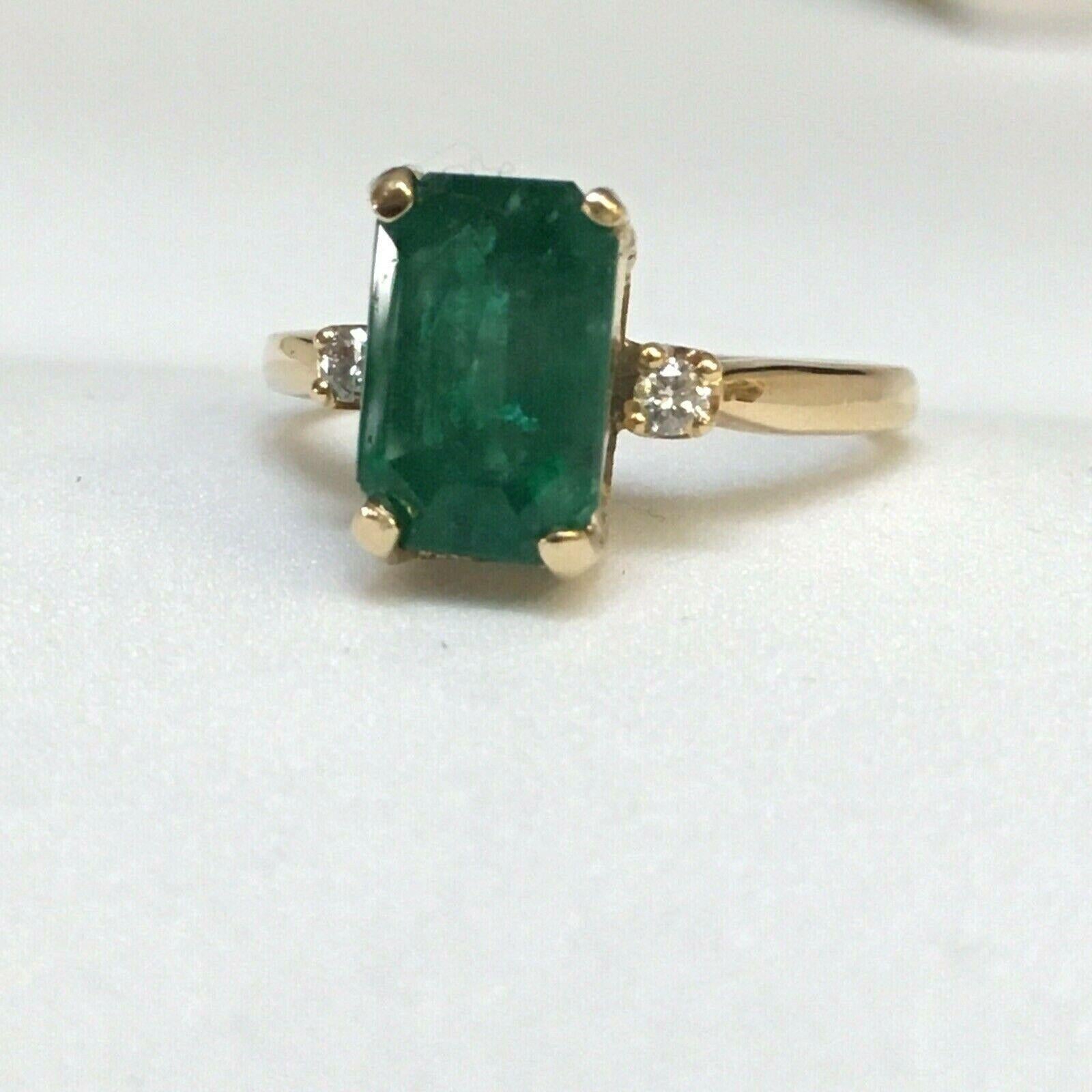 2.25 Carat Natural Emerald 14K Gold Diamond Ring     

Size 7.25
Weighing 3.5 gram
In excellent condition new without tags 
Natural Emerald 10X6.7X4.8 mm approximately 2.25 Carat 
Two round Full Cut Diamonds .04 Carat Total Weight 
Marked, tested