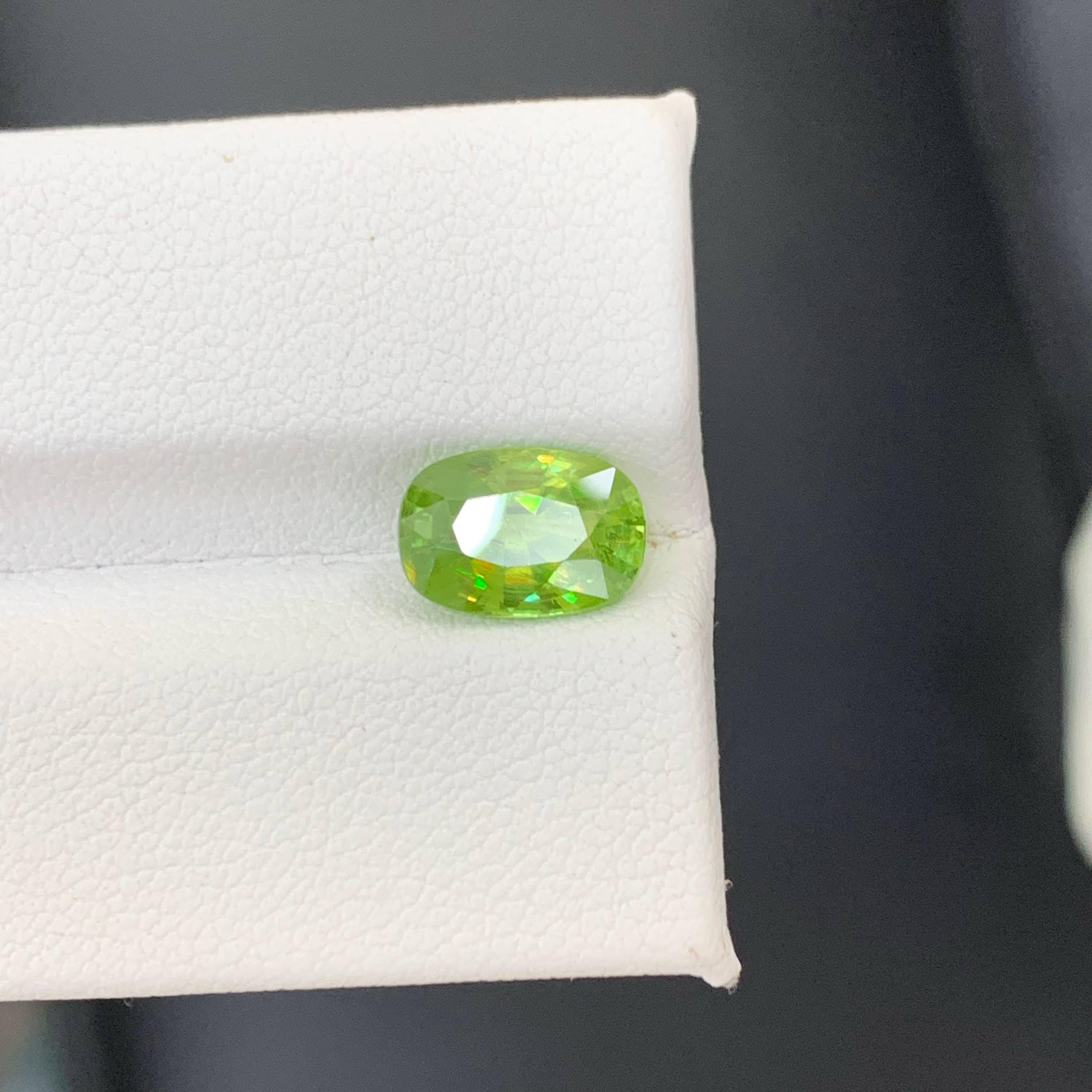 Modern 2.25 Carat Natural Loose Green Sphene Stone Oval Shaped Madagascar's Gemstone For Sale