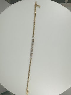 2.25 Carat Oval and Round Diamond Tennis Bracelet in 14K Yellow Gold, 7 Inches