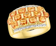 2.25 Carat Oval Cut Natural Yellow Sapphire and Diamond 14 Karat Gold Ring