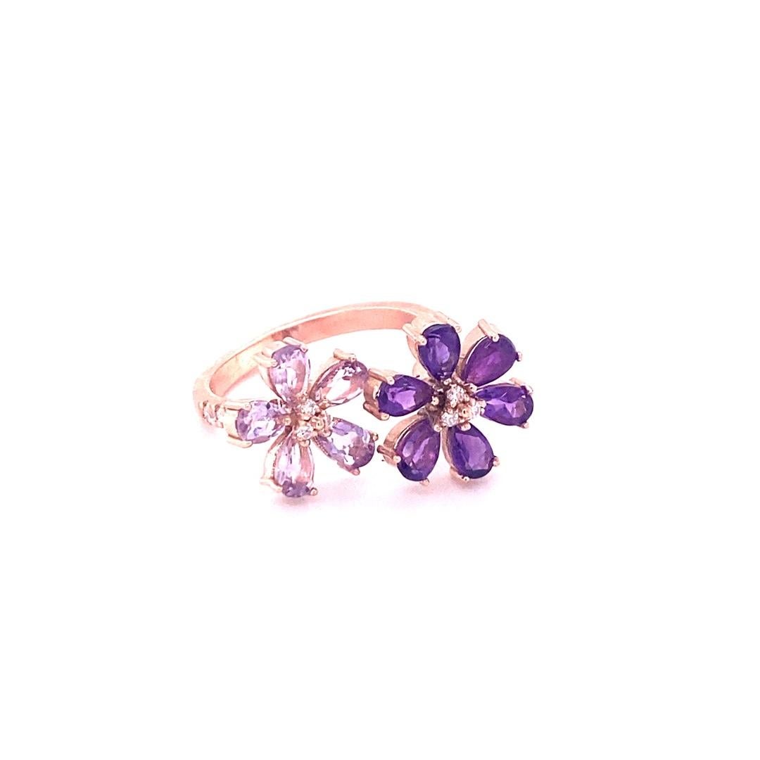 2.25 Carat Pear Cut Amethyst Diamond Rose Gold Cocktail Ring

Flower~Power is what we like to call this beauty!!
This ring has 5 Pink Amethysts and 6 African Amethysts that weigh a total of 2.03 Carats and is embellished with 17 Round Cut Diamonds