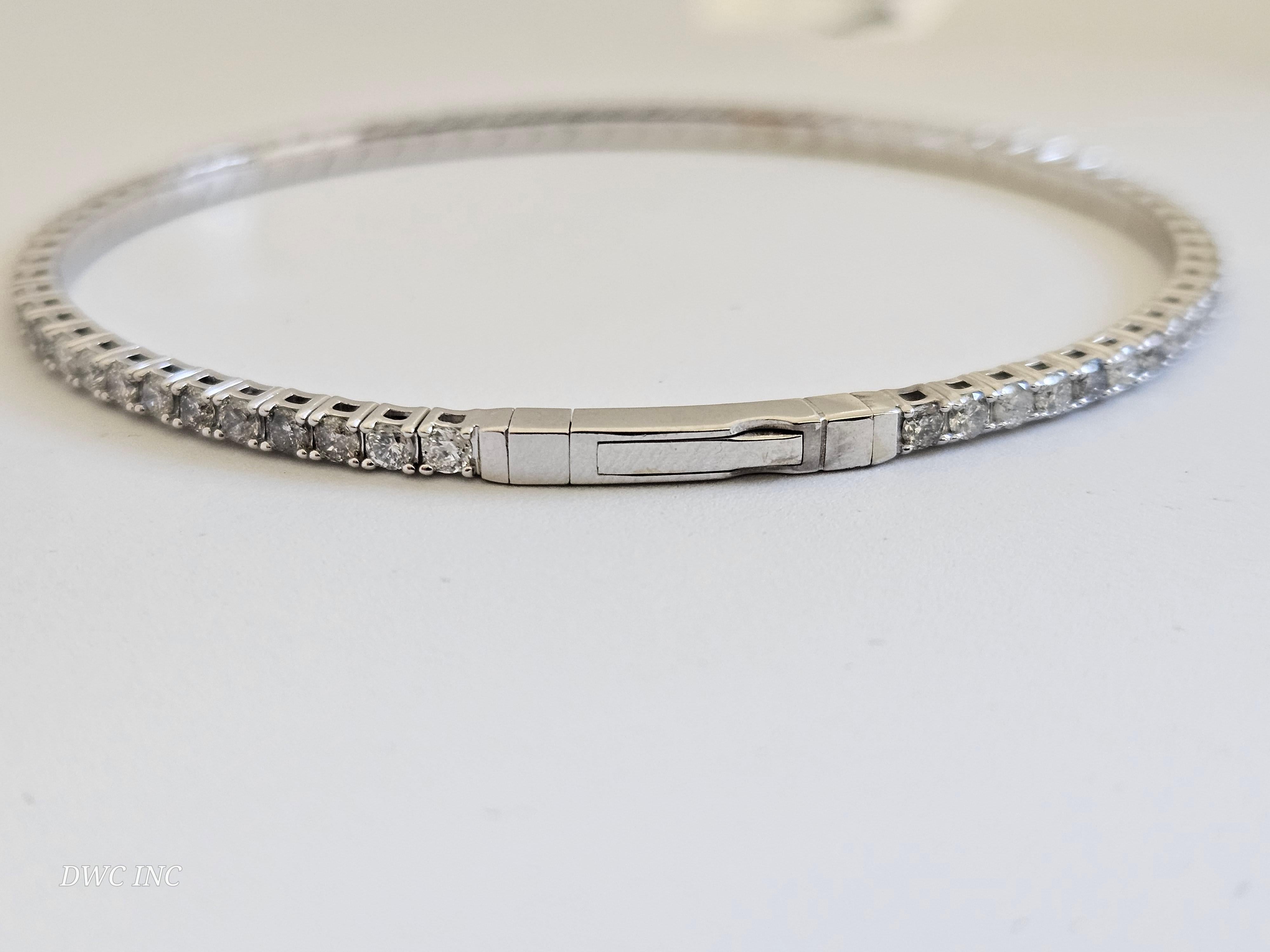 2.25 Carat Natural Diamond Bangle bracelet round-brilliant cut  14k White Gold. 
7 inch. 72pcs Average H-,I  2.4 mm wide. Very Shiny 7.86 grams.