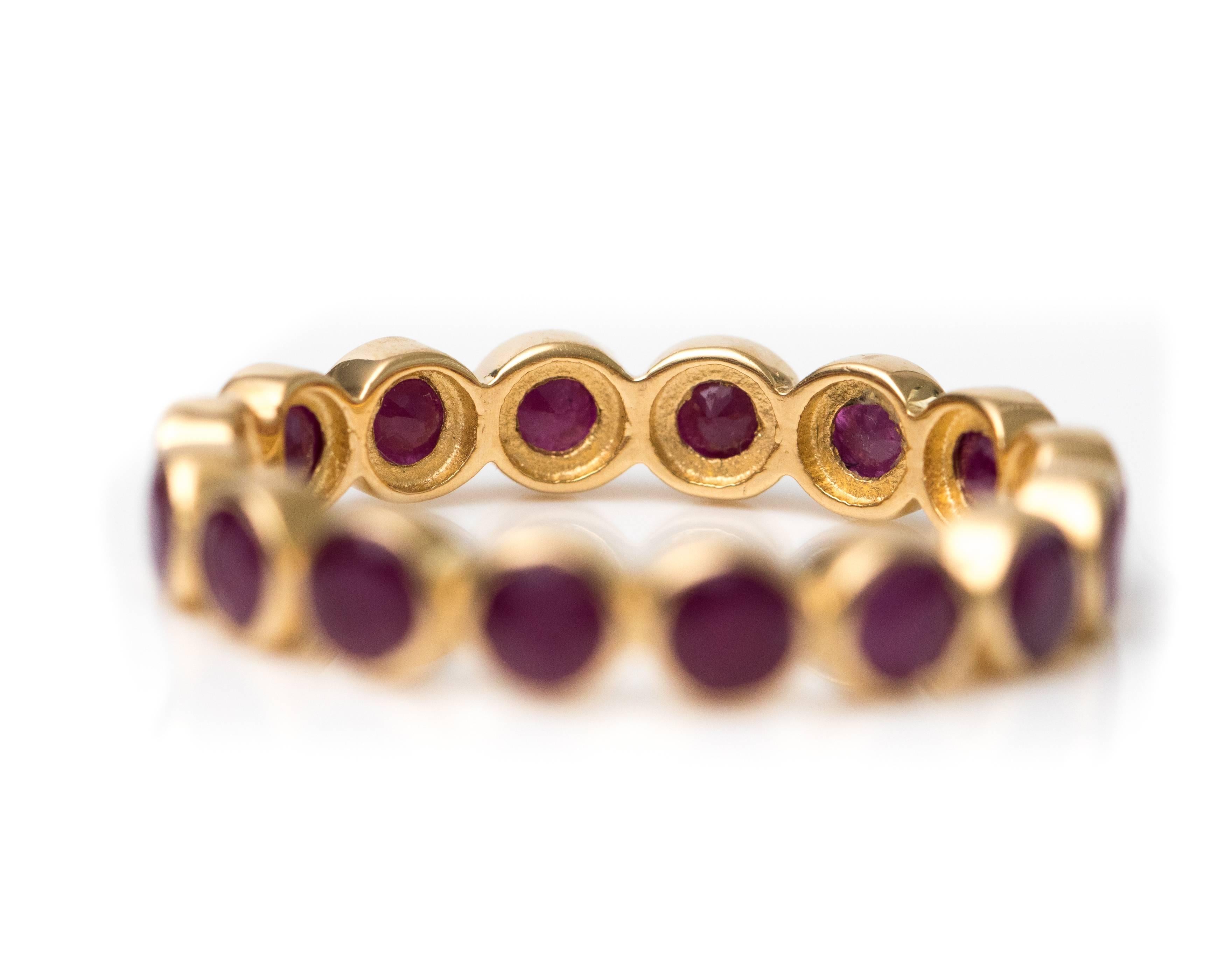 Modern 2.25 Carat Ruby and 18 Karat Yellow Gold Eternity Band For Sale