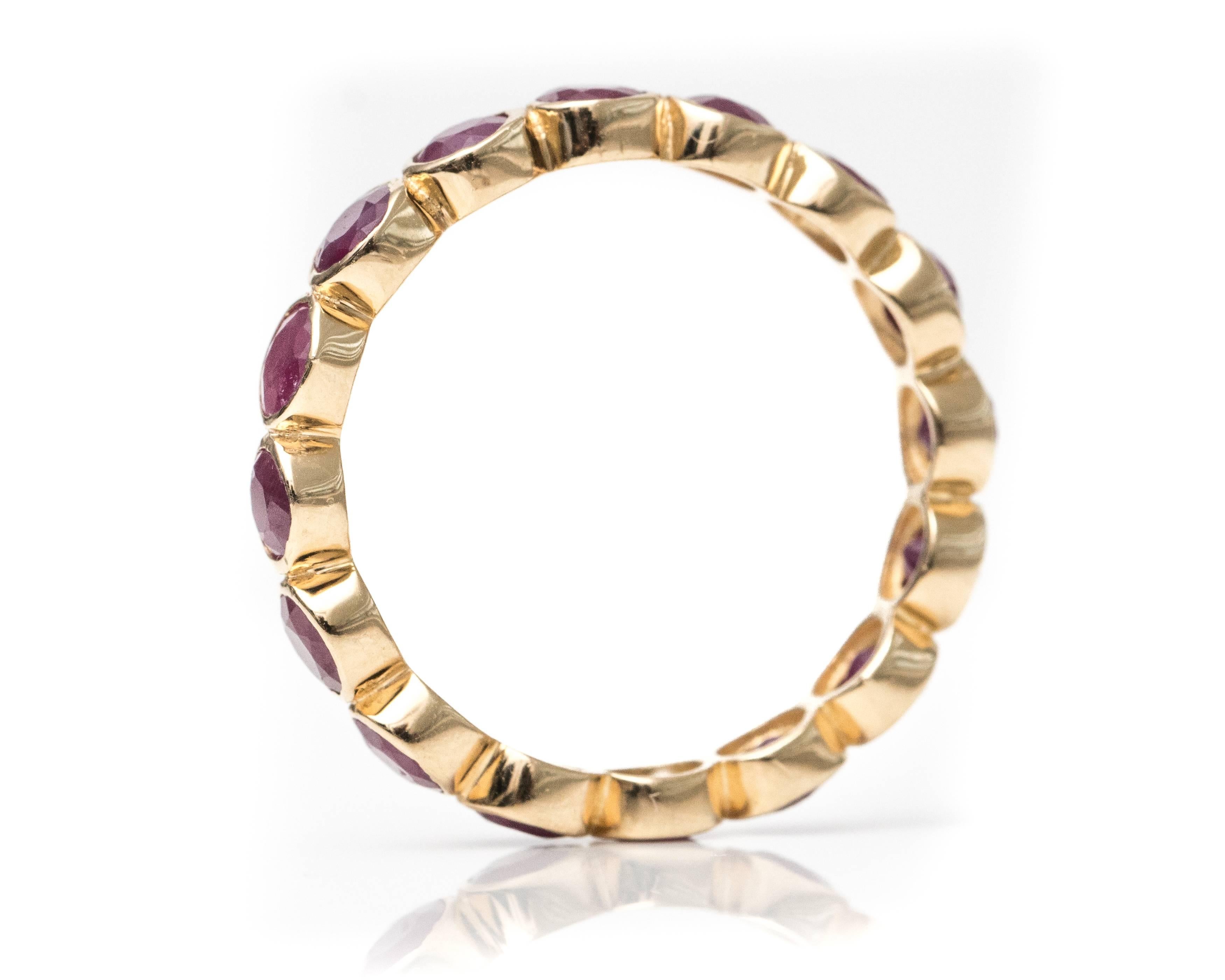 Round Cut 2.25 Carat Ruby and 18 Karat Yellow Gold Eternity Band For Sale