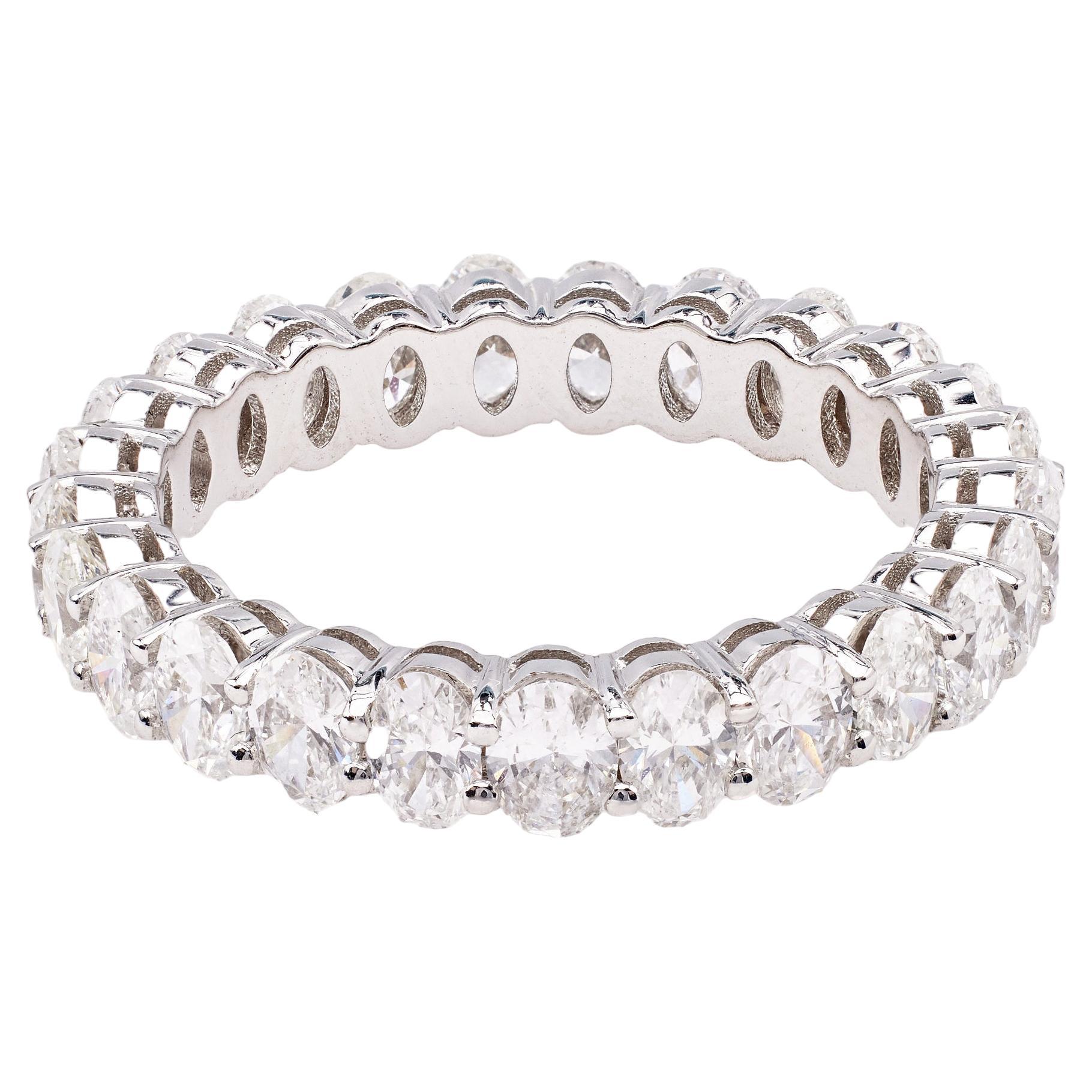 2.25 Carat Total Weight Oval Cut Diamond Platinum Eternity Band For Sale