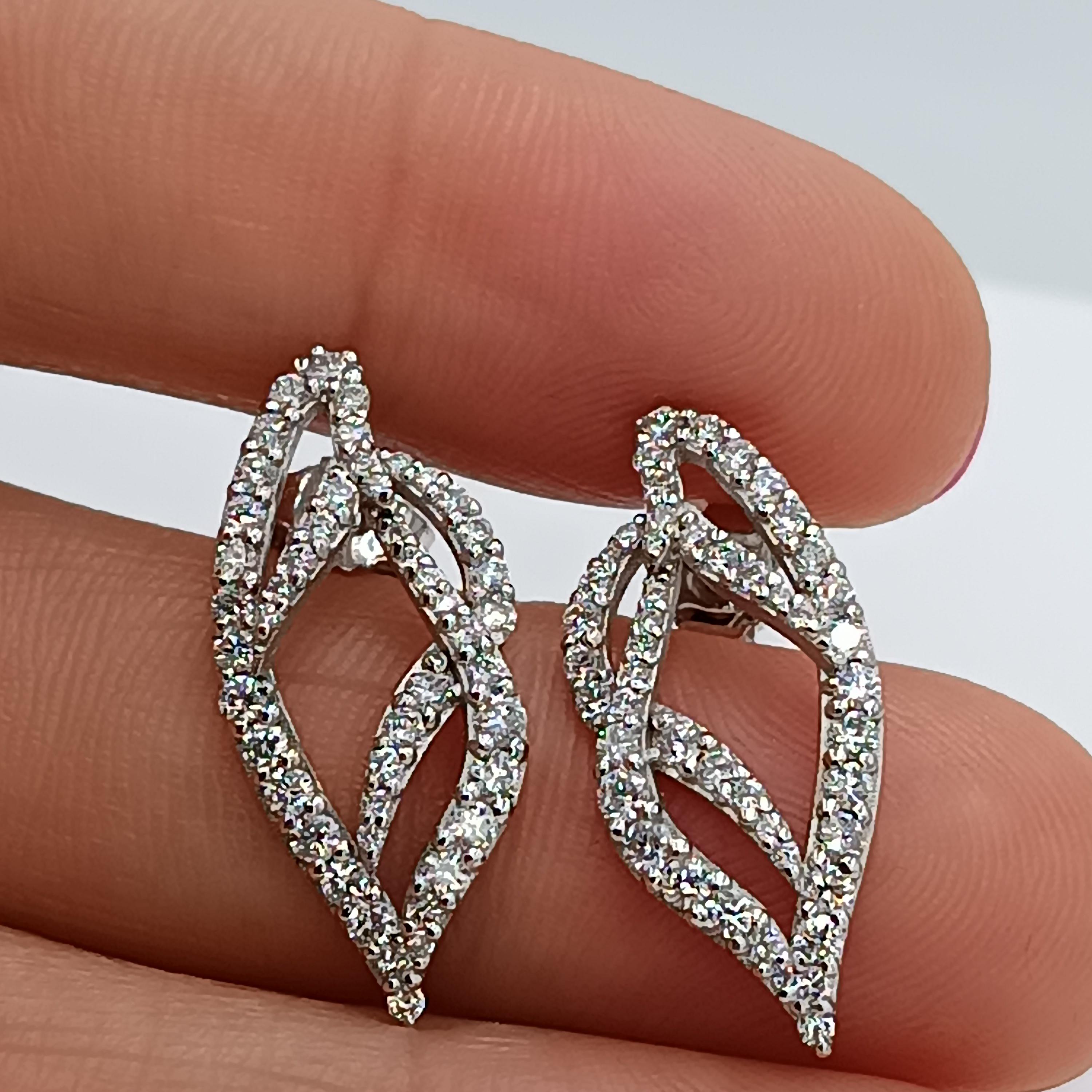 This wonderful Leo Milano Earrings from our Solari collection shows in every detail a very complicate yet perfectly done workmanship. 18 carat white gold  The Earrings weighs 4,44 grams diamonds 2.25 carats. 
any item of our jewelry collection has a