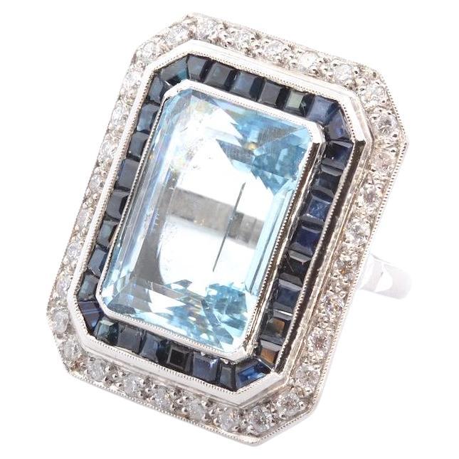 22.5 carats Aquamarine, diamonds and sapphires ring