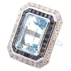 22.5 carats Aquamarine, diamonds and sapphires ring