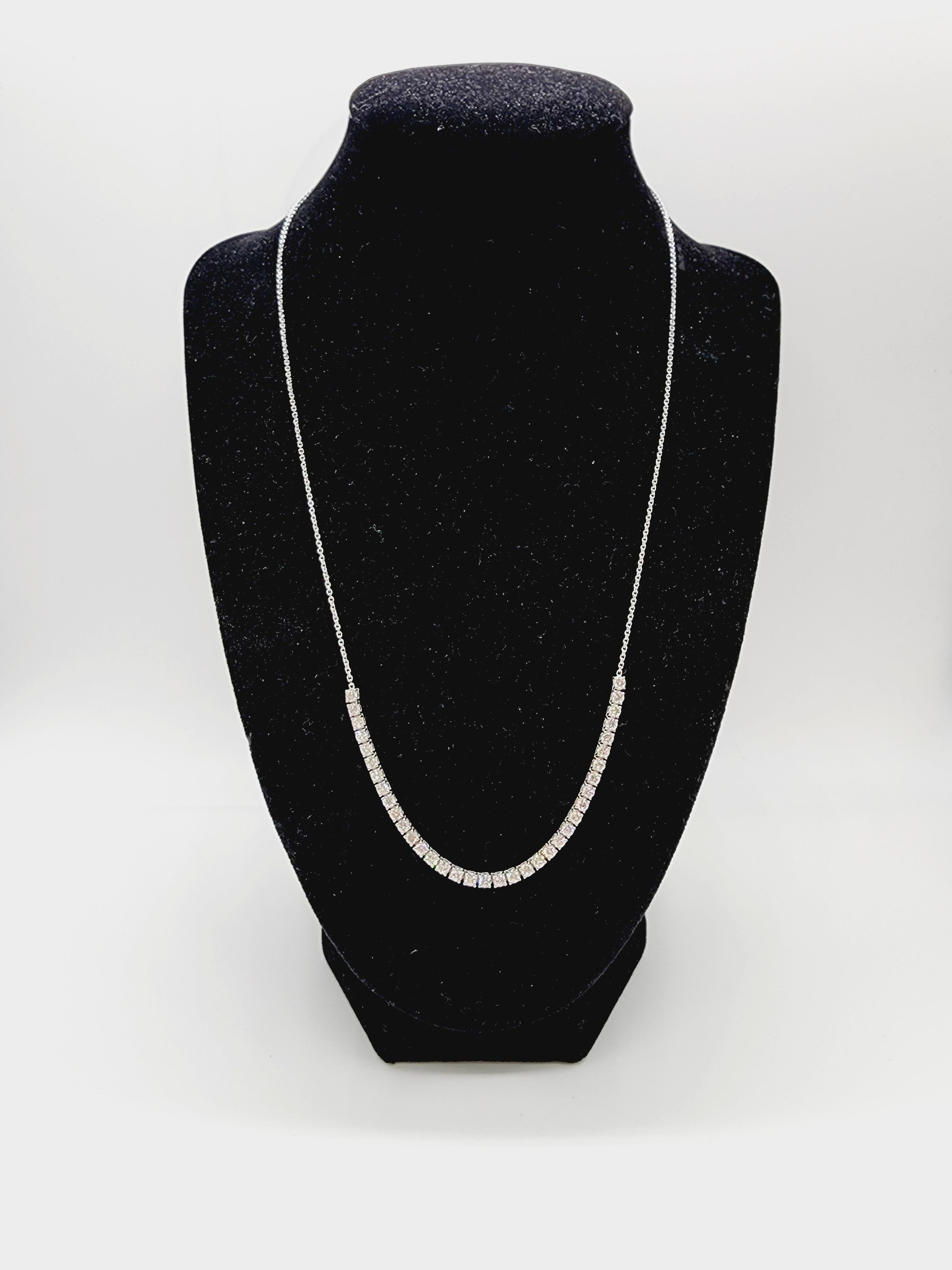 2.25 Cttw Diamond Tennis Necklace 14 Karat White Gold. Diamond link 4 inch, total chain length 20 inch, adjustable to 18 inch with the extra loop. Average Color H, Clarity VS. natural diamonds. Adorn every way.