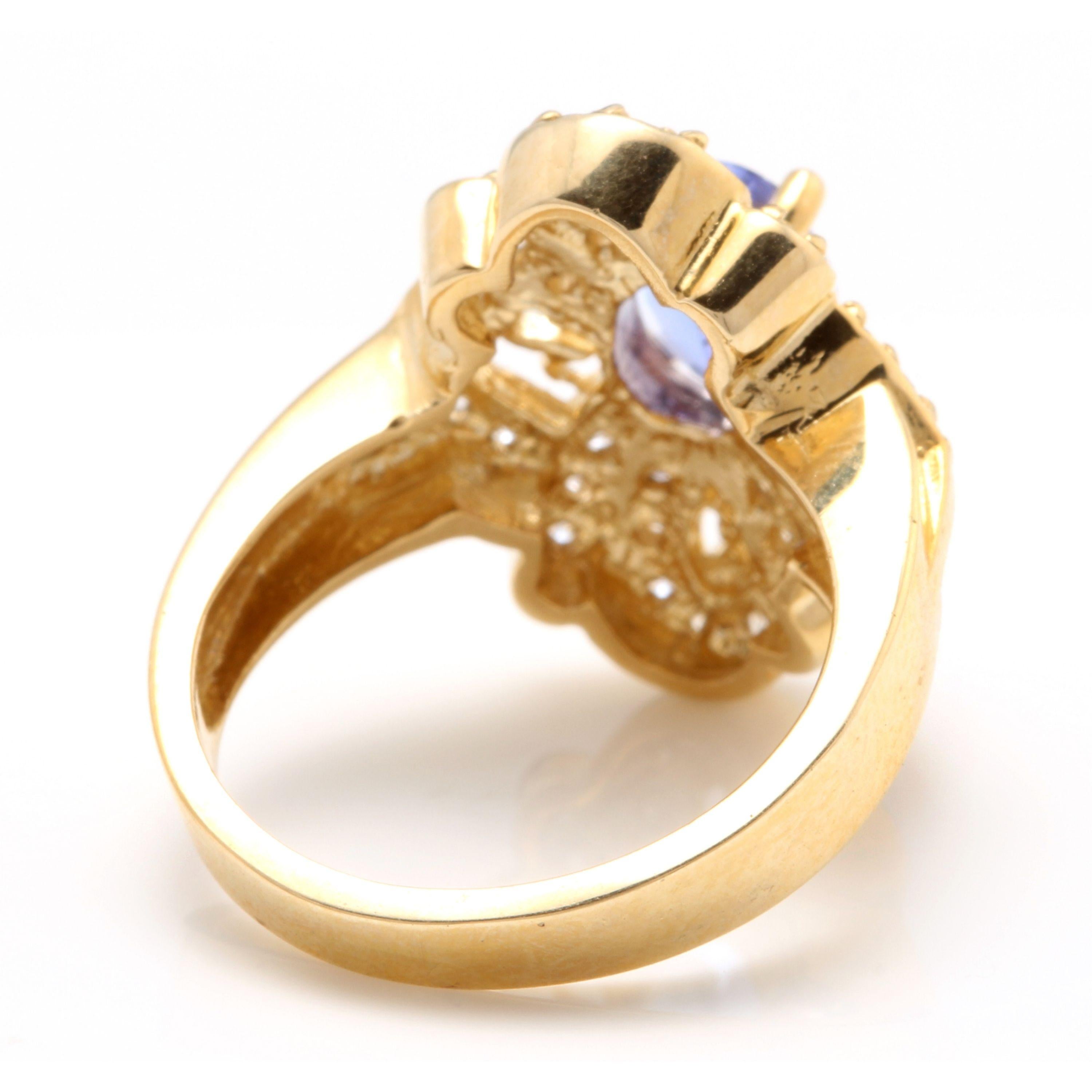 2.25 Carat Natural Very Nice Looking Tanzanite and Diamond 14 Karat Solid Gold In New Condition For Sale In Los Angeles, CA