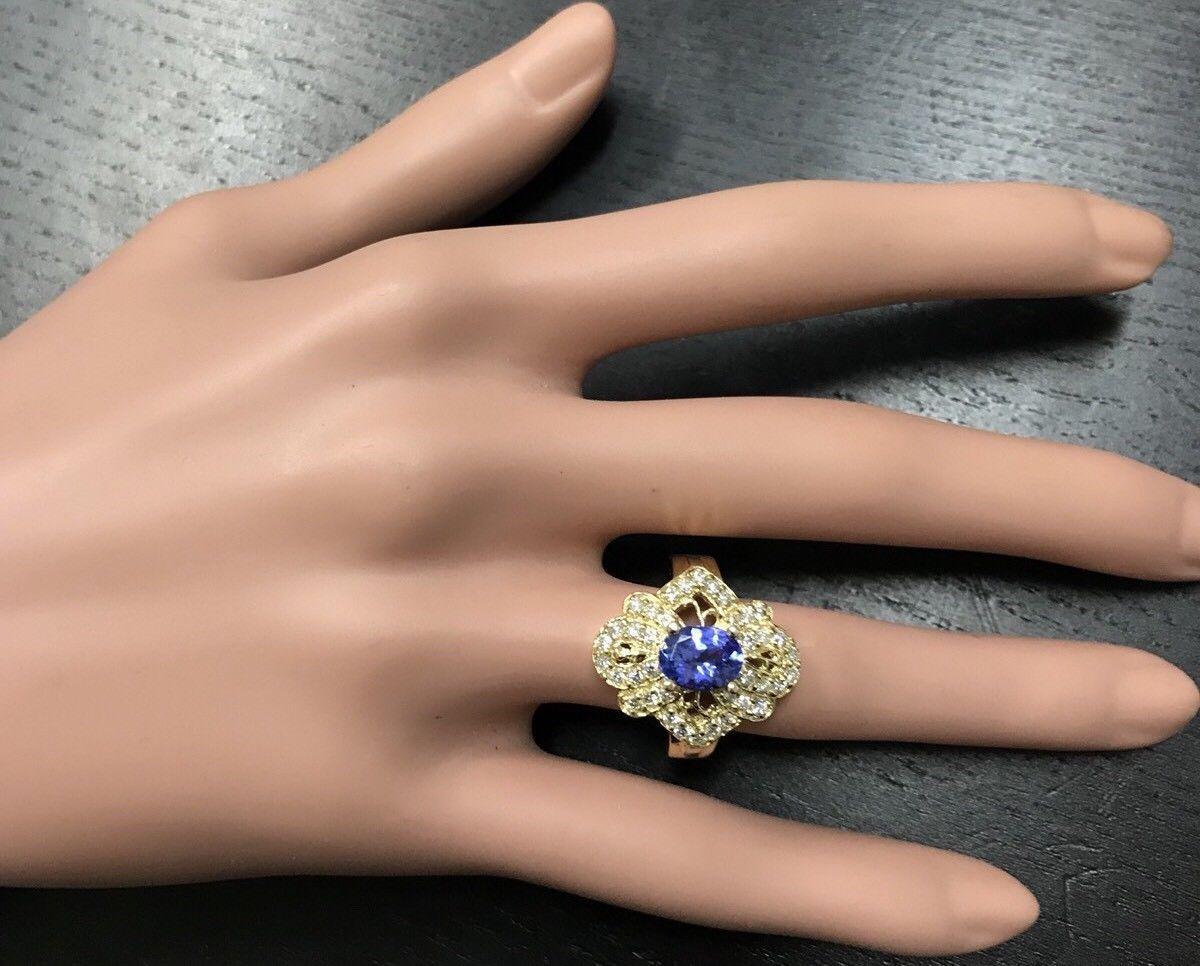 Women's 2.25 Carat Natural Very Nice Looking Tanzanite and Diamond 14 Karat Solid Gold For Sale