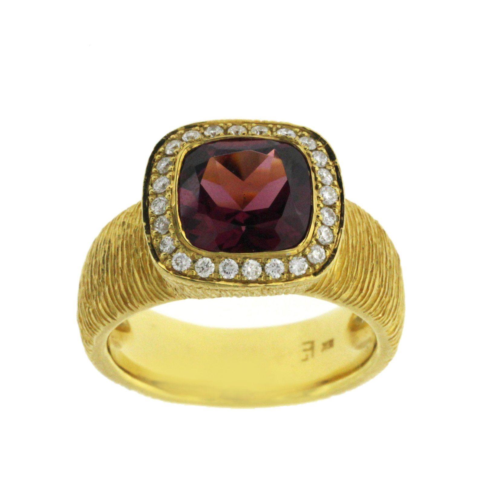 Top: 11.5 mm
Band Width: 6 mm
Metal: 18K Yellow Gold 
Size: 5-7 ( Please message Us for your Size )
Hallmarks: 750
Total Weight: 11.4 Grams
Stone Type: 2.25 CT Natural Pink Tourmaline & 0.26 CT G SI1 Diamonds
Condition: Pre Owned
Estimated Retail