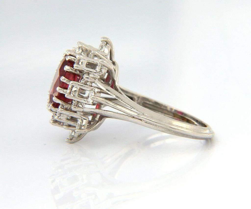Women's 2.25 CT Ruby and 1.00 CTW Diamond Halo Starburst Frame Ring in 18kt White Gold For Sale