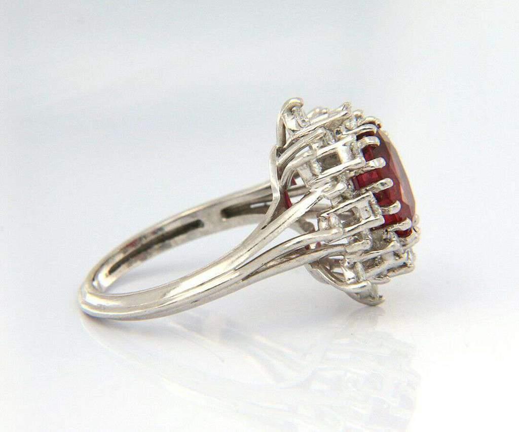 2.25 CT Ruby and 1.00 CTW Diamond Halo Starburst Frame Ring in 18kt White Gold For Sale 2