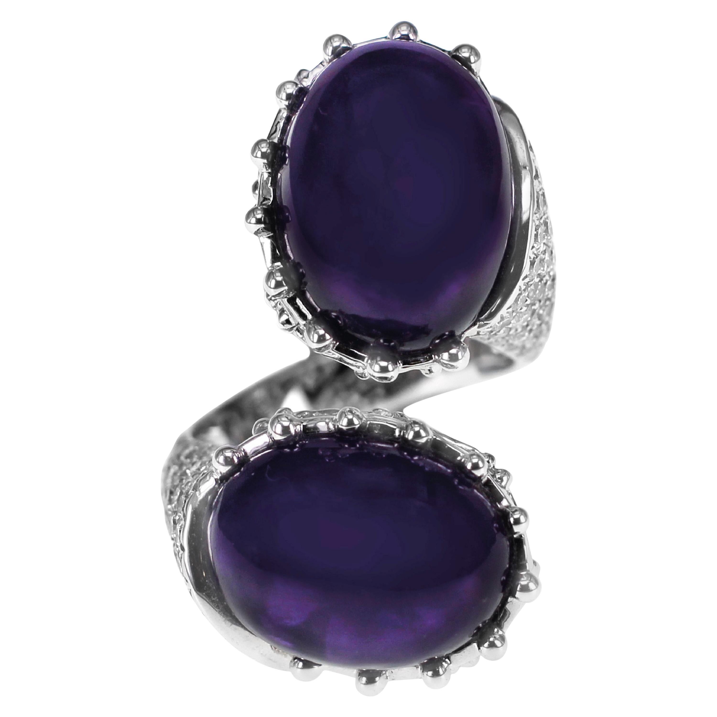 22,50 Karat tiefvioletter Amethyst-Diamantkopf-Turner-Ring