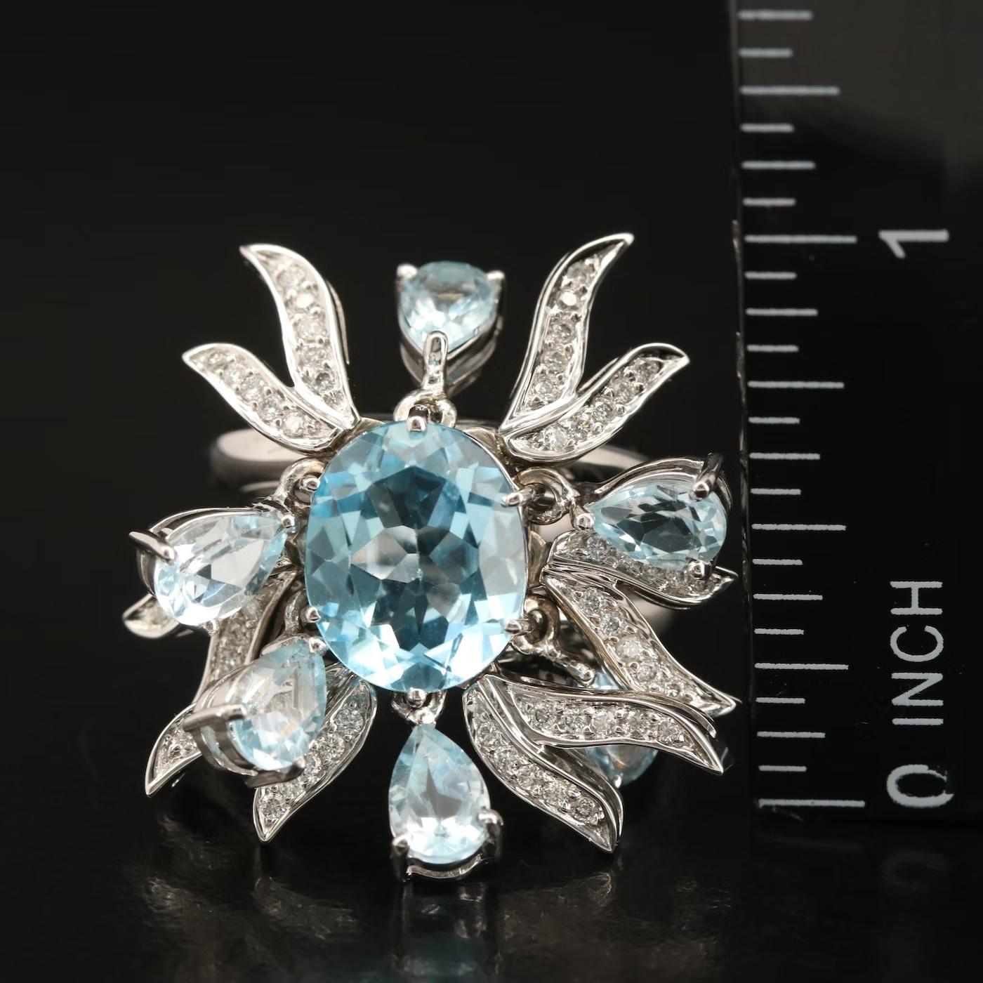 Taille ovale Ruth Grieco for Denoir / Bague articulée en topaze bleu ciel et diamants 18 carats, 22500 $