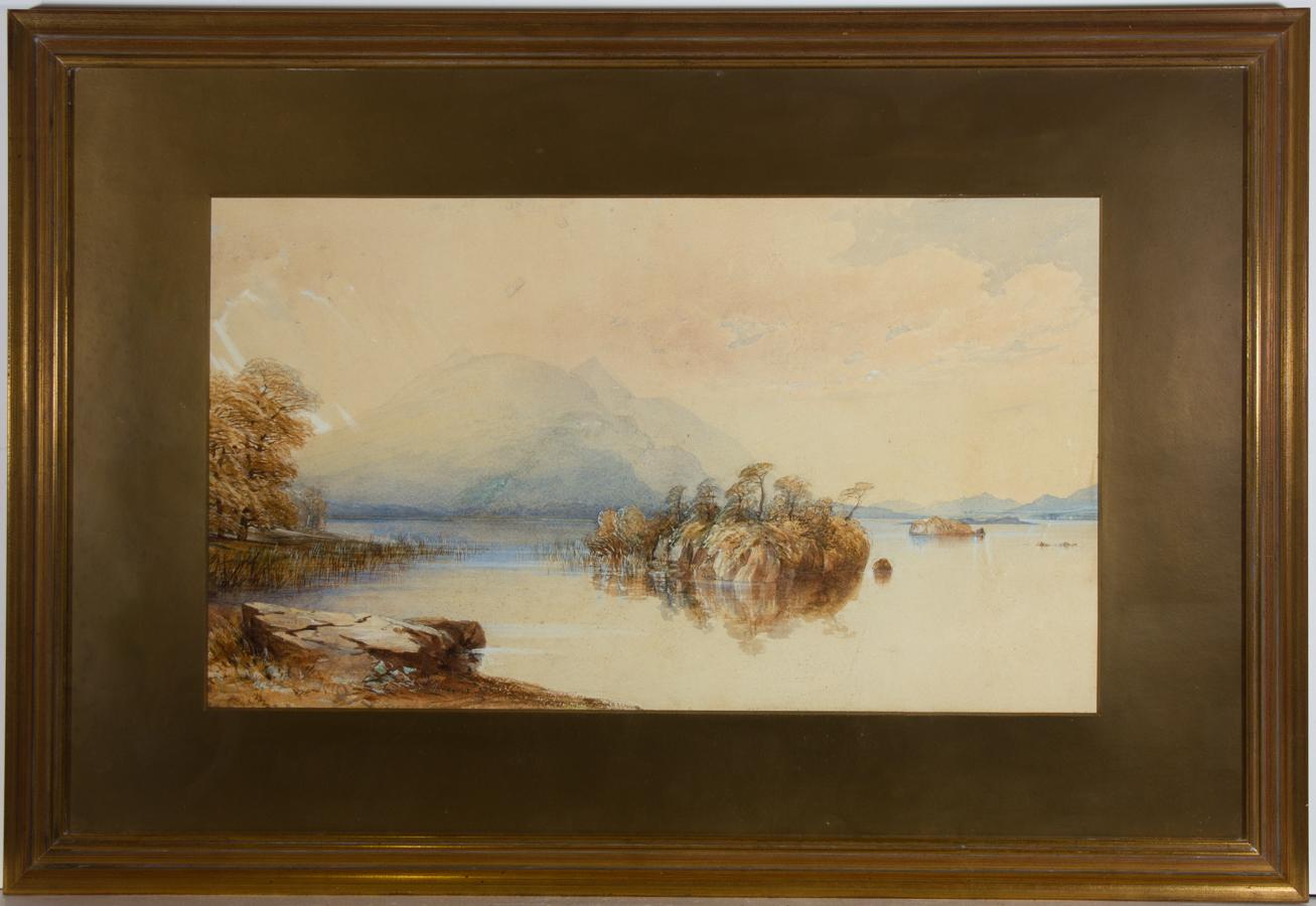 A delightful late 19th or early 20th century watercolour study of a lake island with large mountains in the distance. Inscribed on the reverse with the name Lady C. Weismann. Well presented in a gilt mount and gilt frame. Unsigned. On watercolour