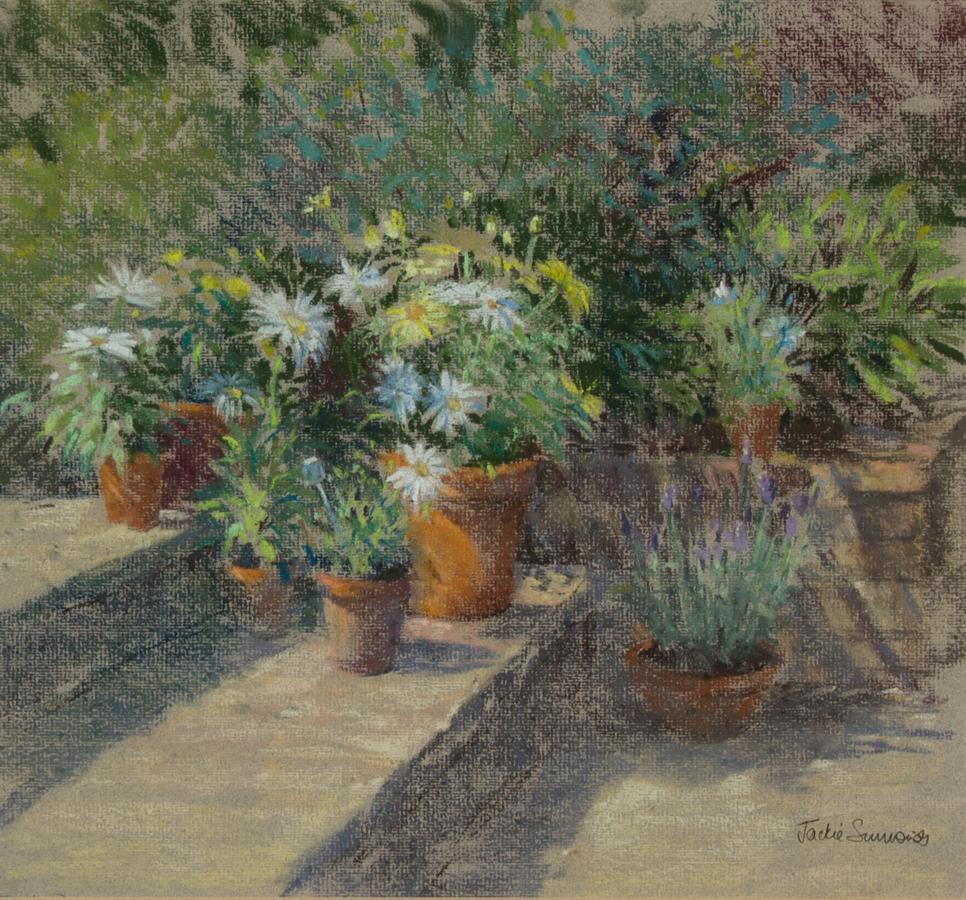 A fine unfixed pastel painting by the British artist Jackie Simmonds, depicting flower pots in a sunny garden setting. The vibrant colour palette and use of light and shade beautifully highlight the artist's proficiency in the medium and subject.