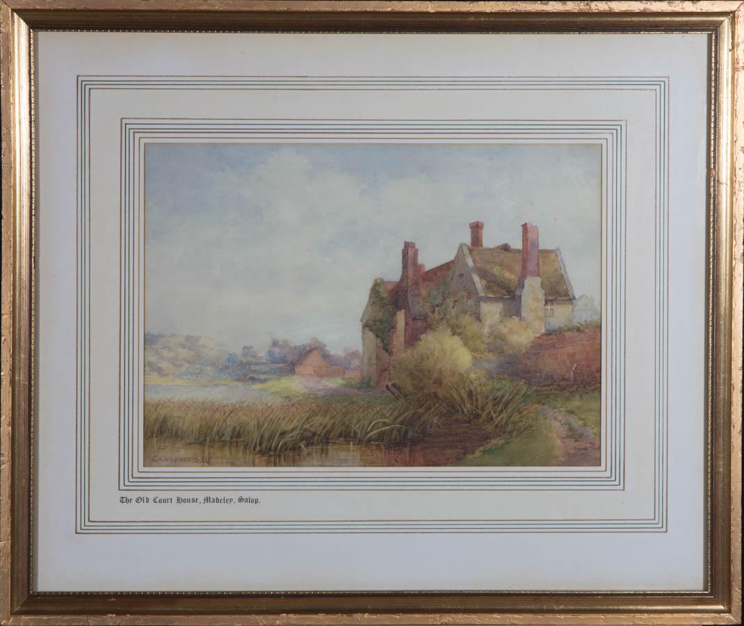A charming watercolour painting by E.A. Hopwood. The scene depicts a view of the old court house in Madeley, Shropshire. Signed and dated to the lower left-hand corner. Location inscribed on the mount. Well-presented in a washline card mount and in